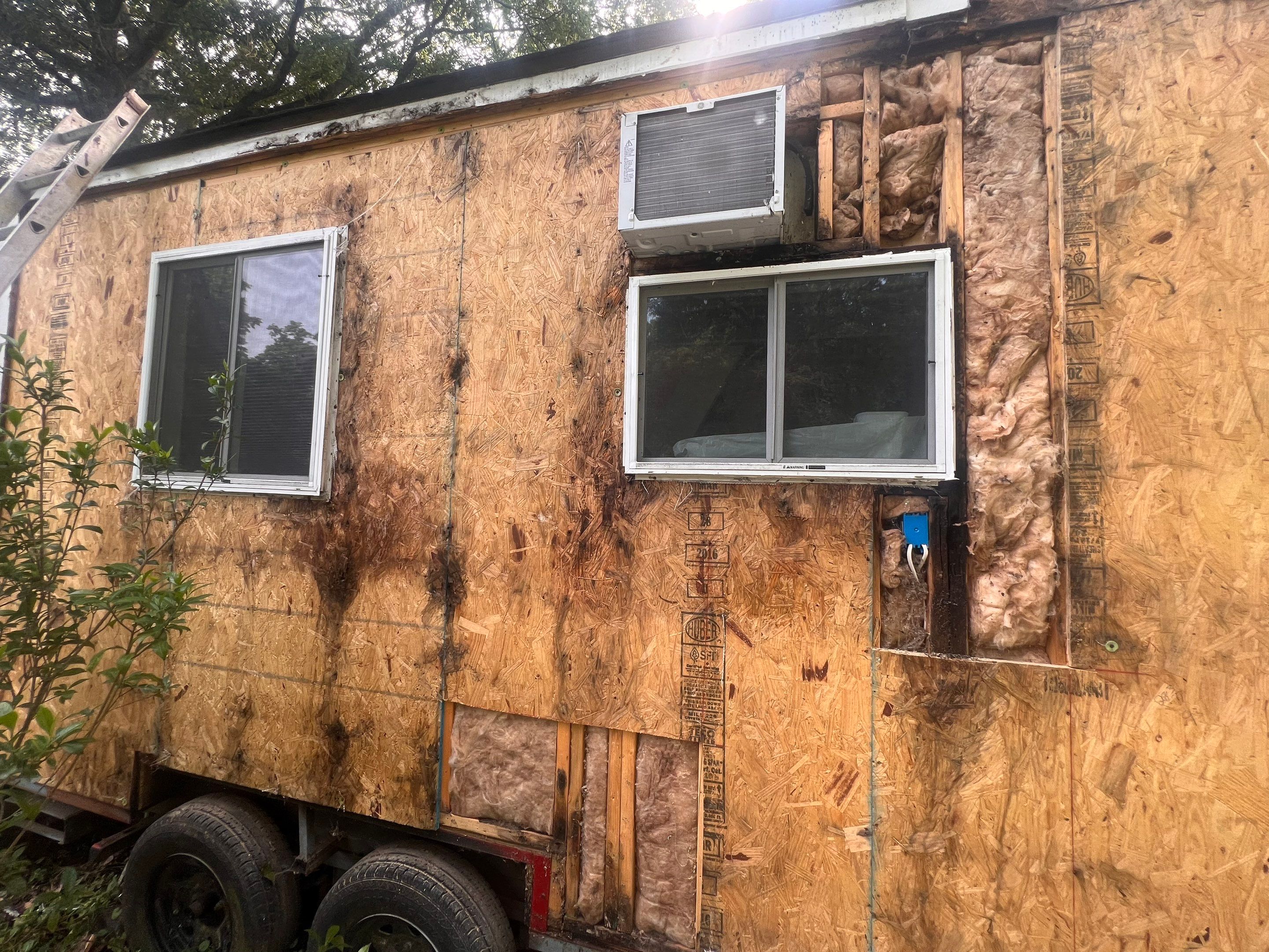 tiny home remodel- siding,paint,roofing by Nailed It Roofing & Remodeling LLC