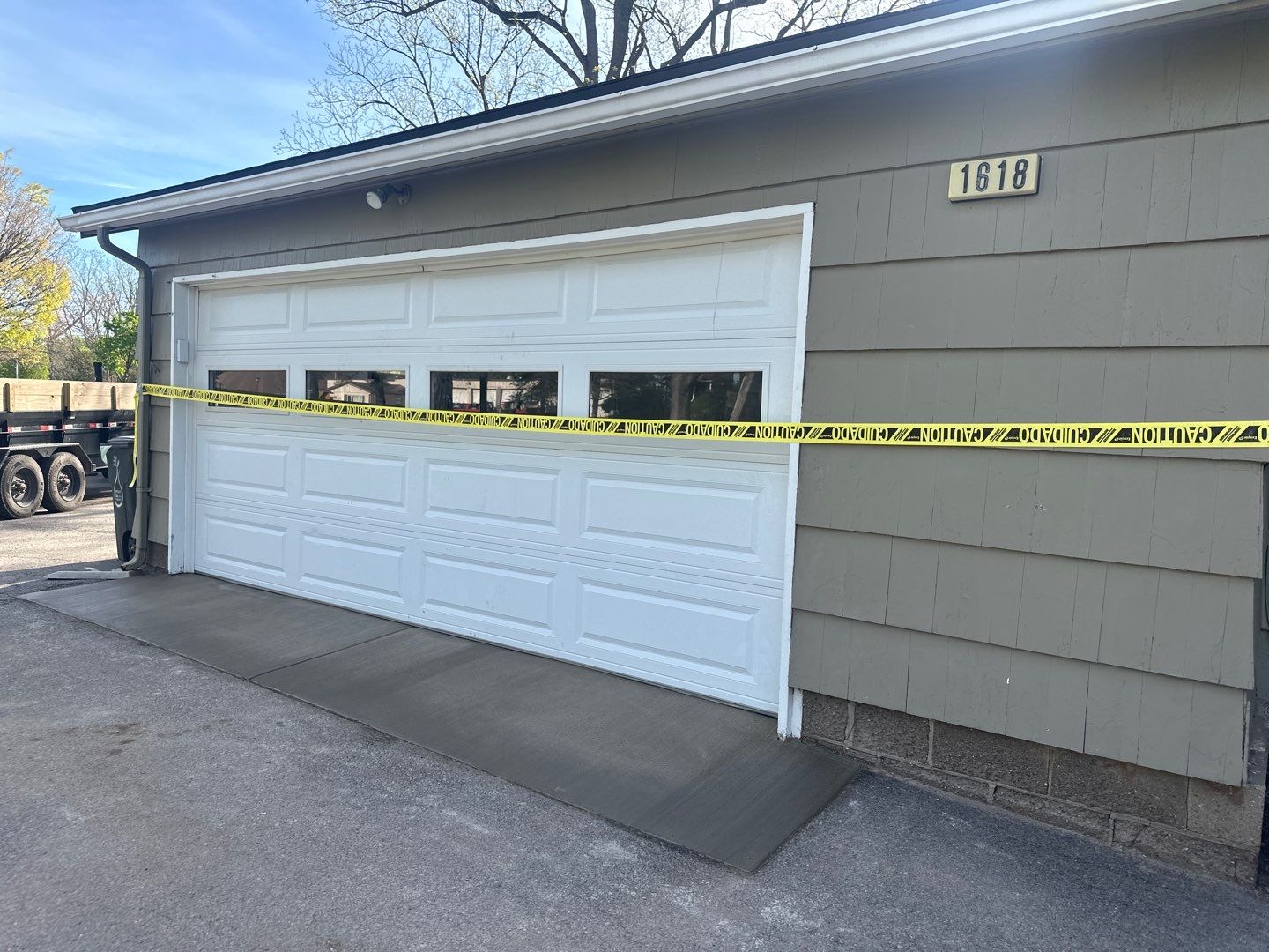 Concrete garage floor replacement with a broom finished apron  by NG Masonry & Construction LLC