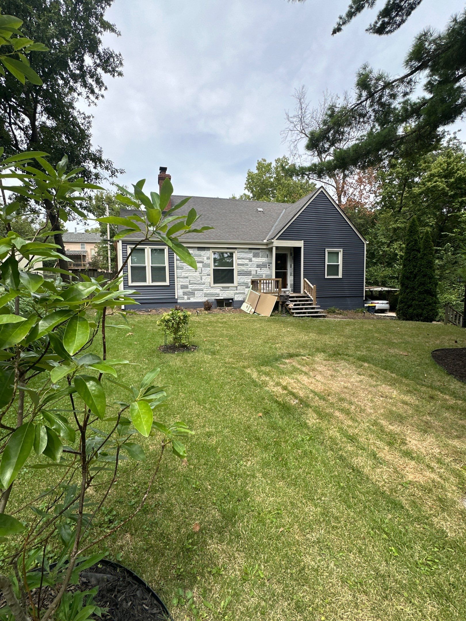 Kansas City Indigo Insulated Craneboard Siding and Window Replacement Project in Kansas City by EEC Windows, Siding & Roofing