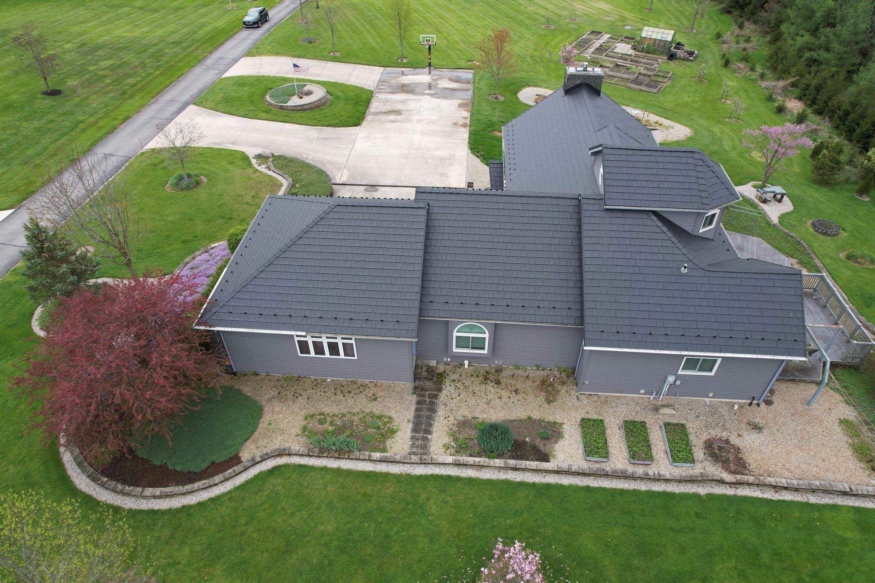 Residential Roofing Installation using Vic West Nothridge Slate by 4Ever Metal Roofing