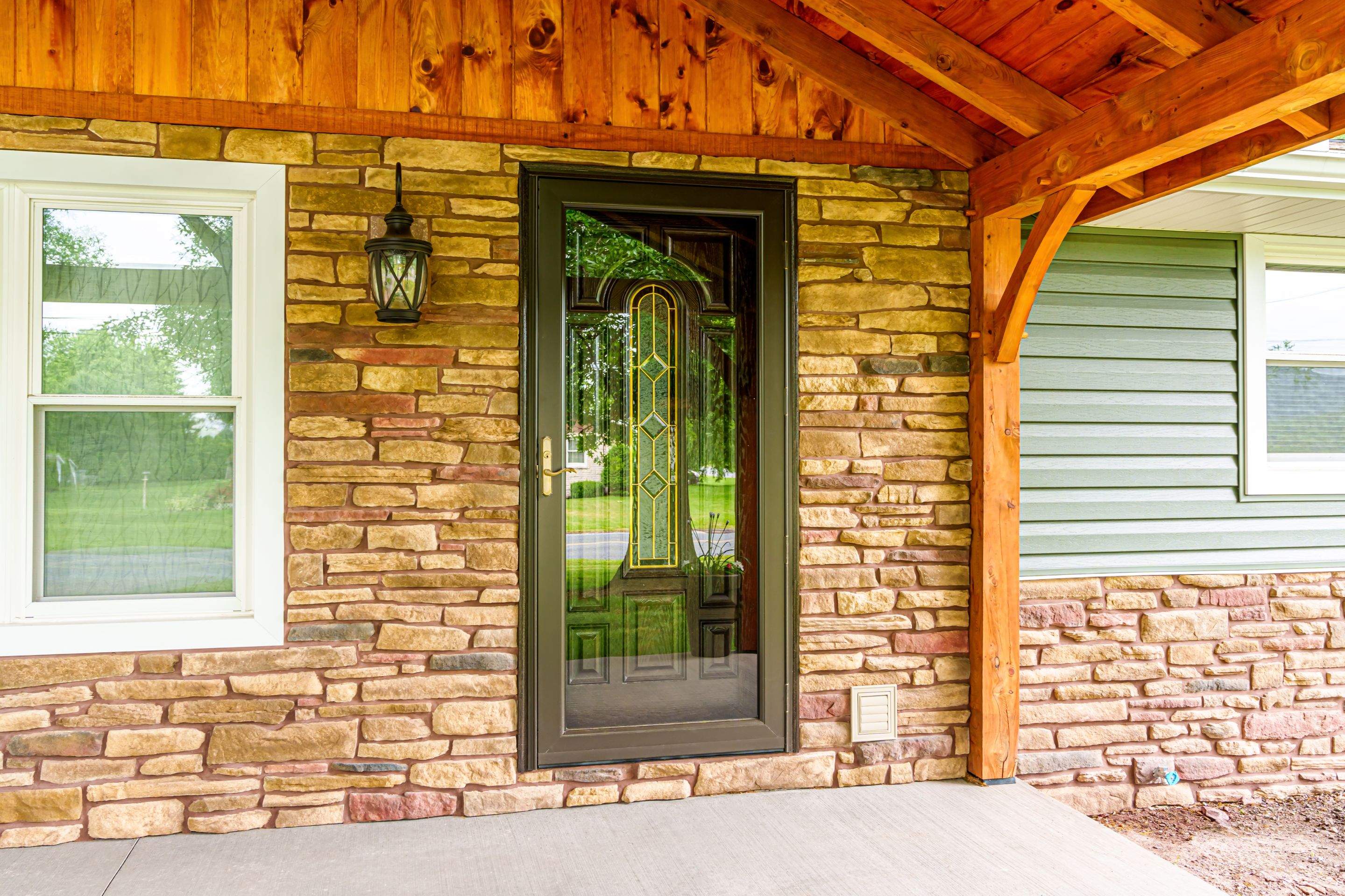 Shingle Roof- new siding- entry door by Esh Builders