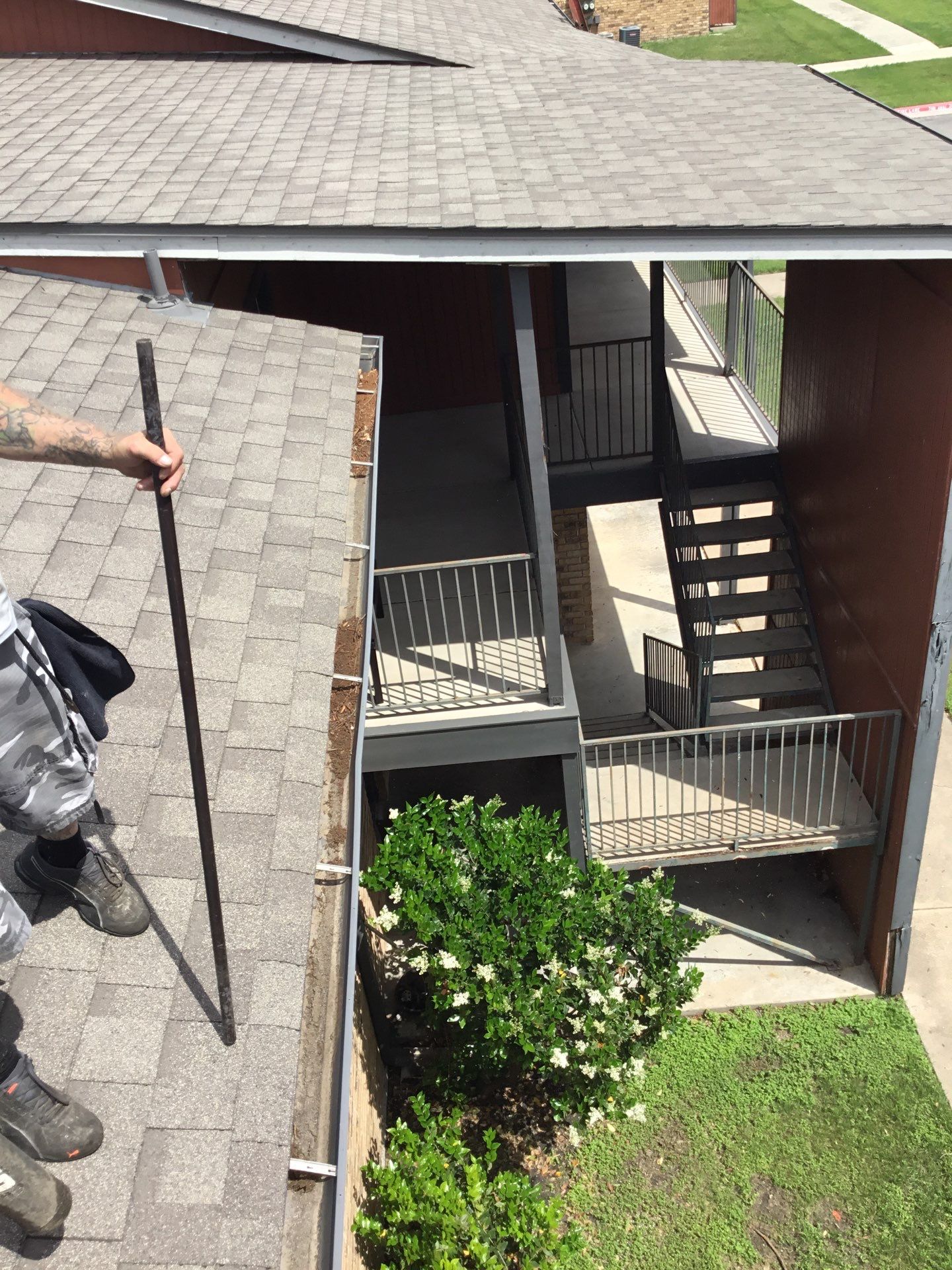 HOA gutter cleaning before photo.