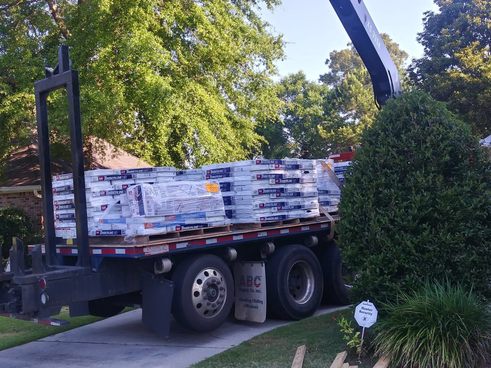 Residential Roofing Installation using Roof Replacement by American Roofing & Construction LLC