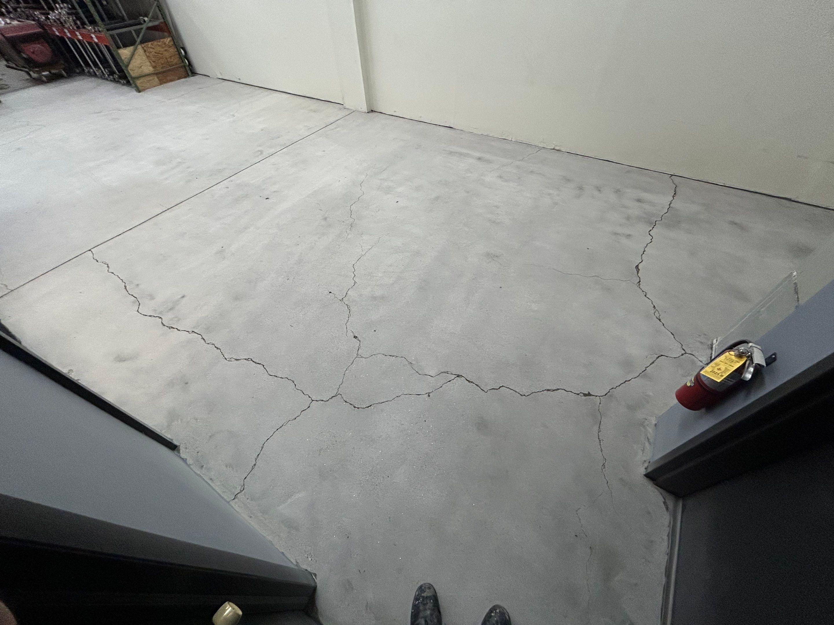 Garage Floor Coating Transformation by DiGiorgi Roofing and Siding Inc