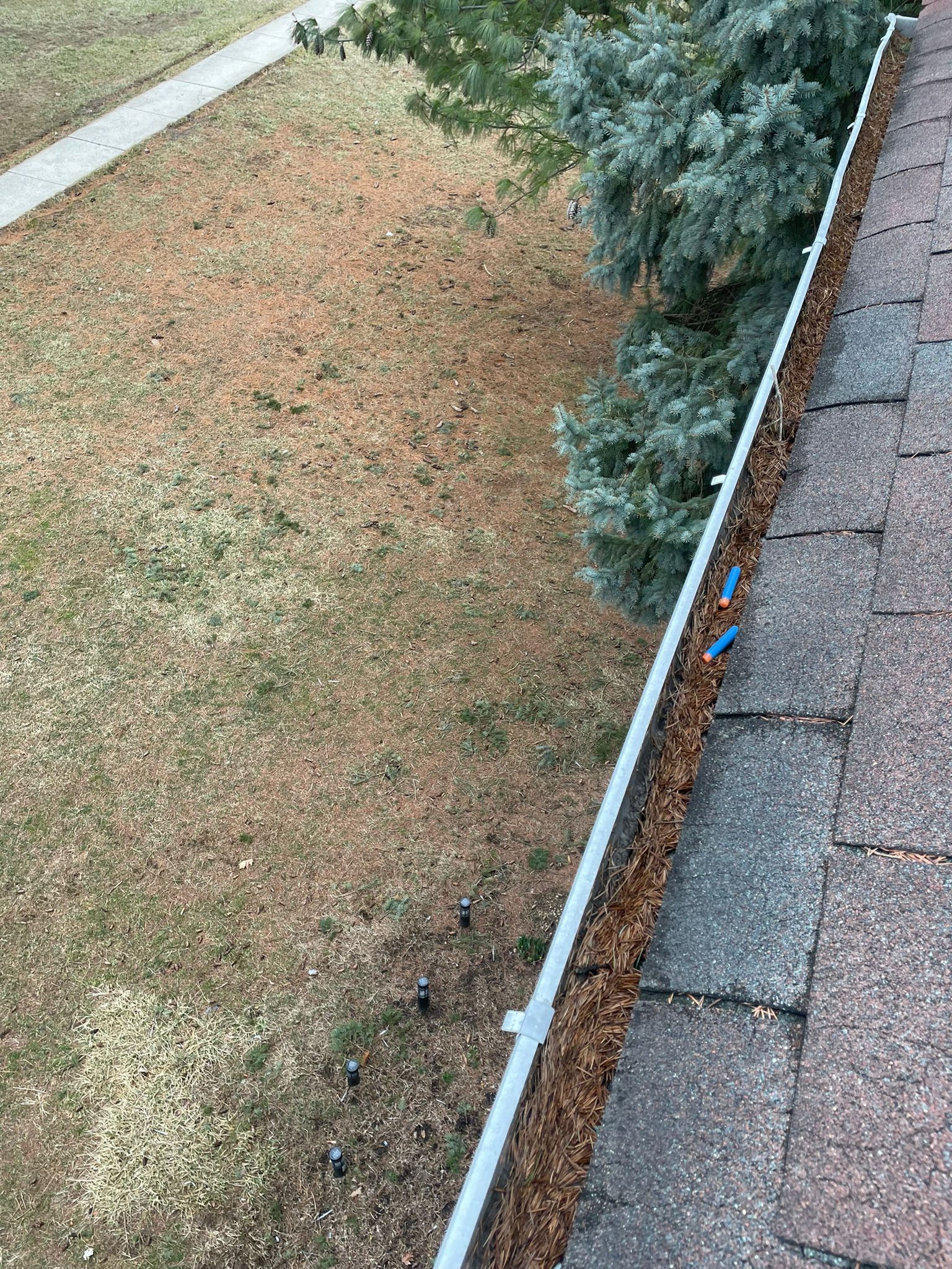 Commercial gutter cleaning Reading, PA before photo with filled gutters