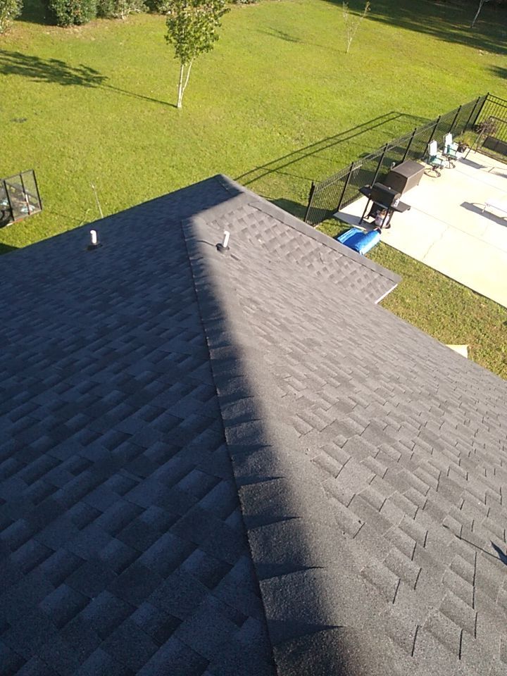 Residential Roofing Installation using Roof Replacement by American Roofing & Construction LLC