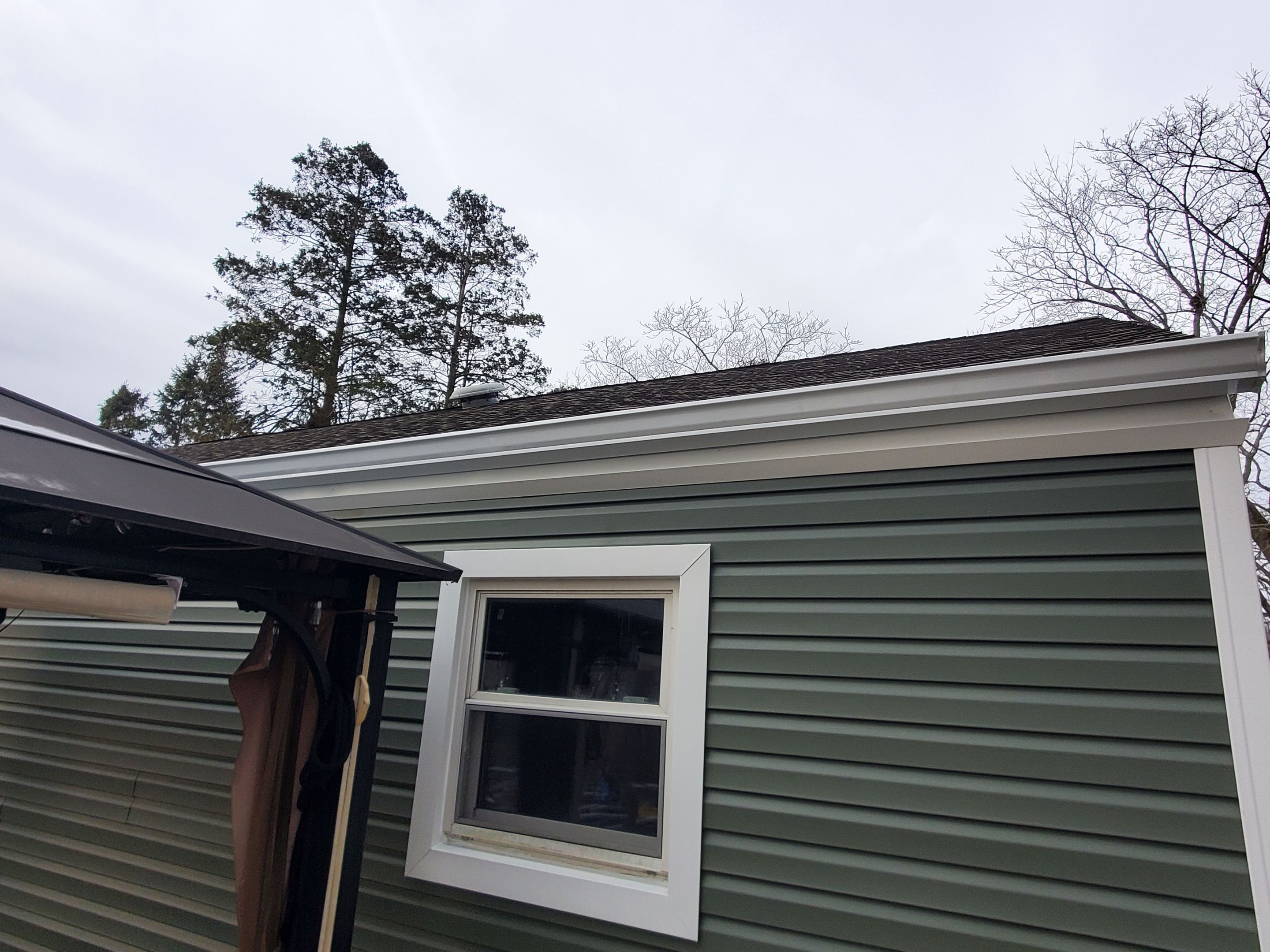 Siding Installation using Certainteed Mainstreet Forest Green by A Plus Exterior