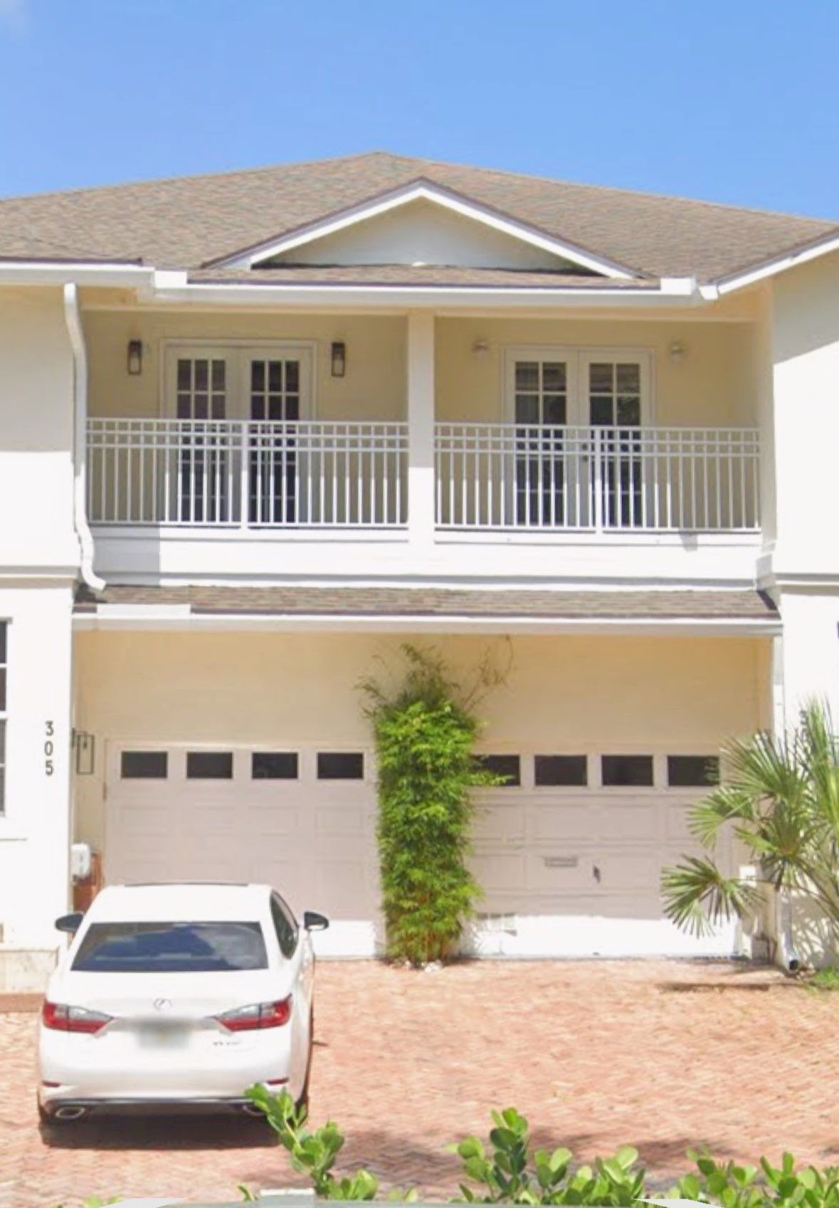 Clopay Modern Steel Garage Door Installation in Fort Lauderdale by The Door Doctor of South Florida, Inc.