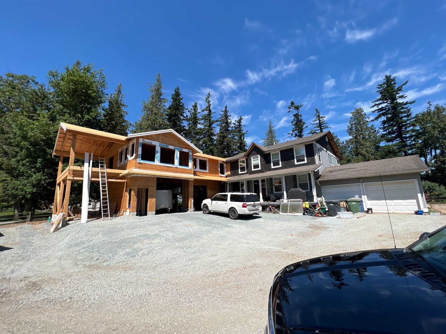 Residential Roofing Installation using OC Oakridge shingles and Duraclad Accent roof by Top Notch Roofing Inc