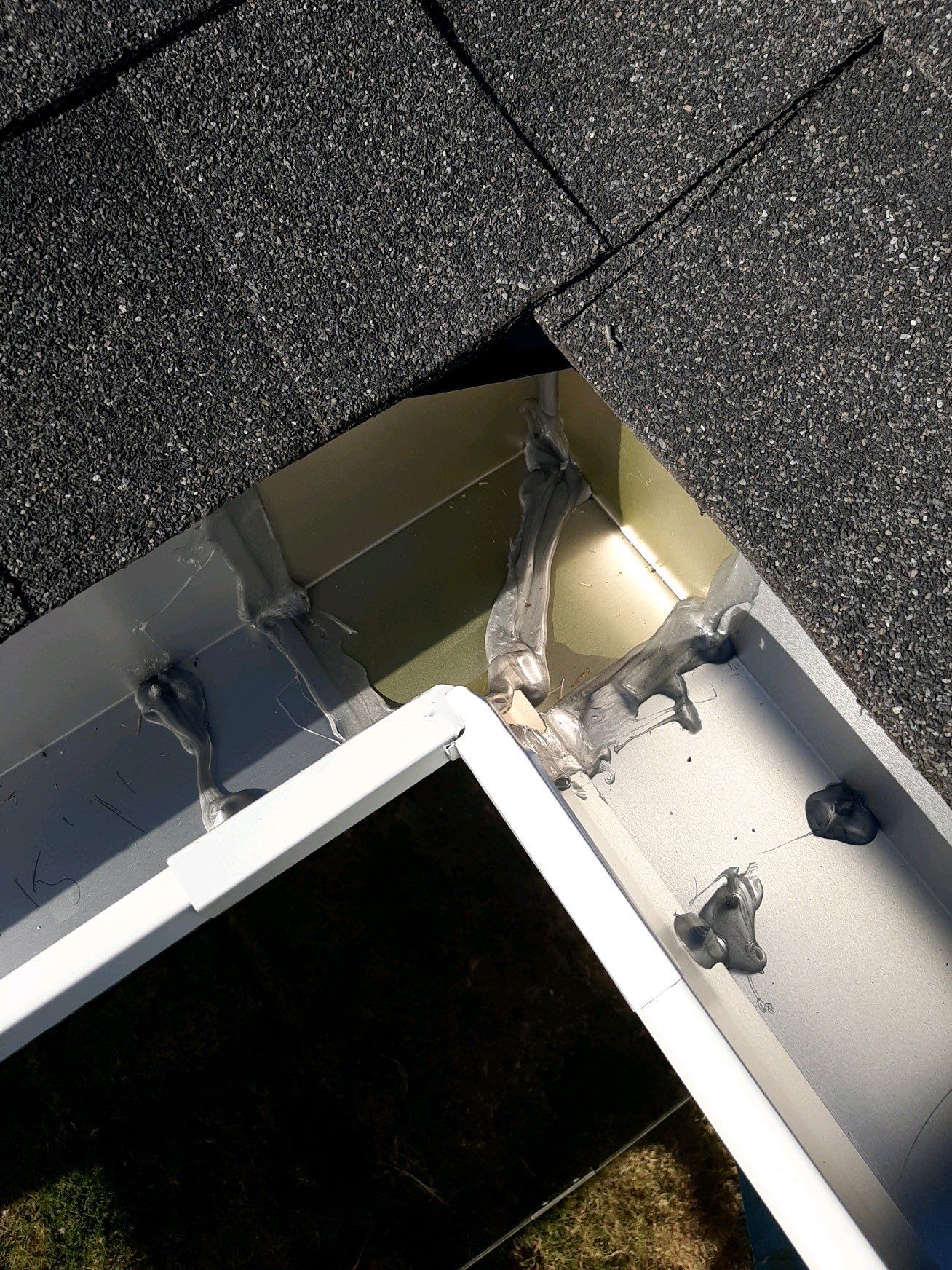Seamless Gutter Installation Using White K-Style Gutters by Gutter Professors