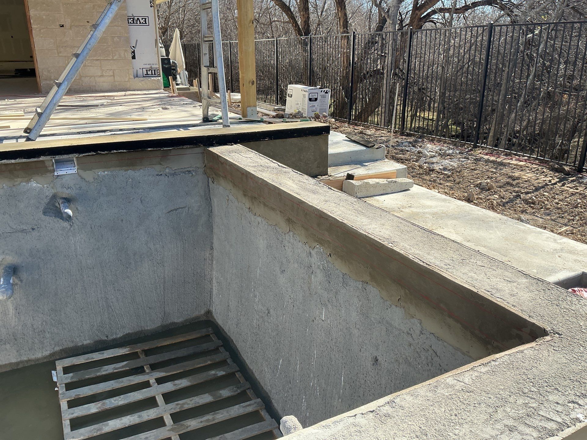 Modern Geometric Pool with Dark Interior Finish by Pinnacle Pools and Spas - DFW