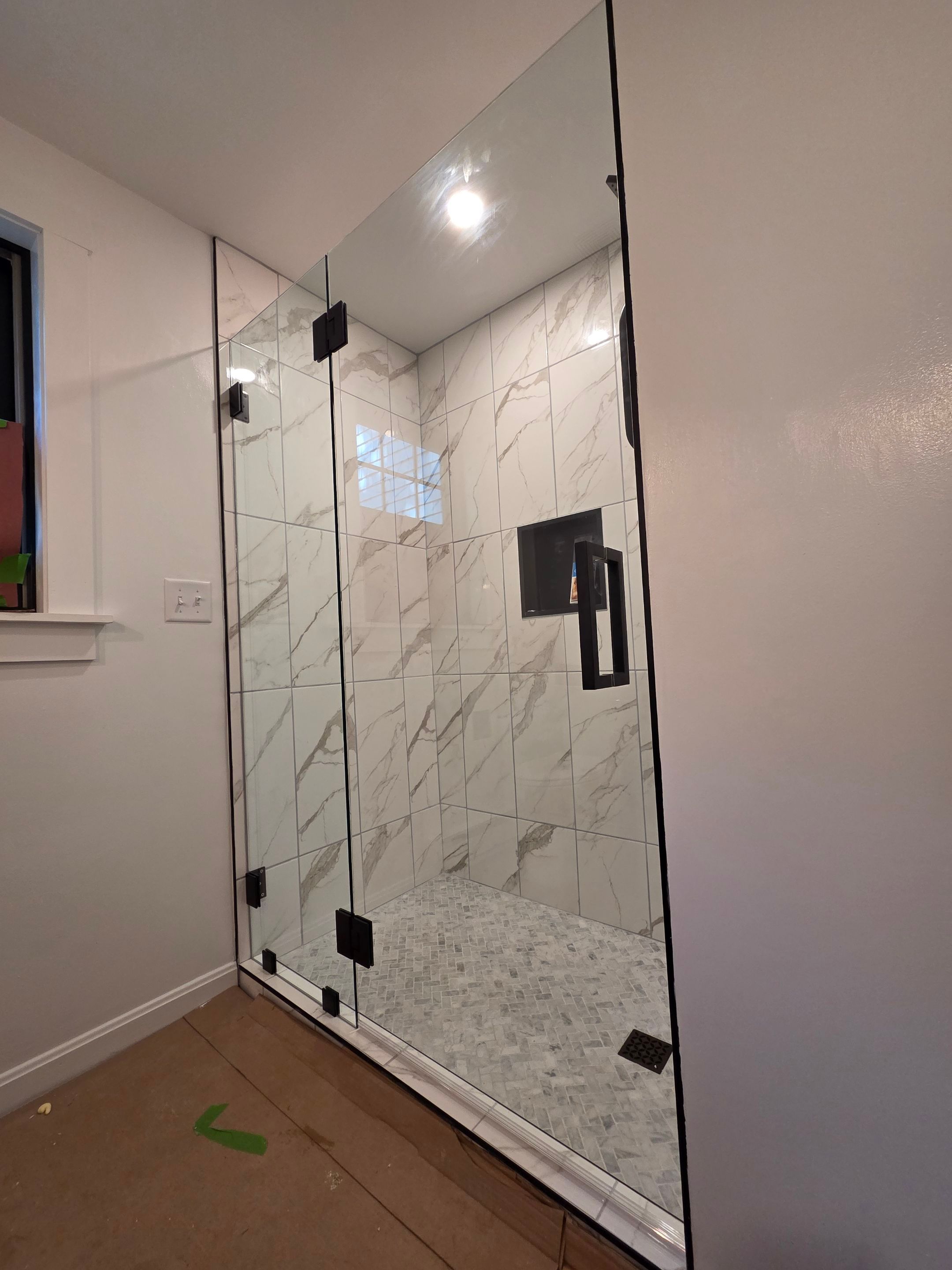 Two Showers using Tempered Shower Glass by Cheshire Glass Company