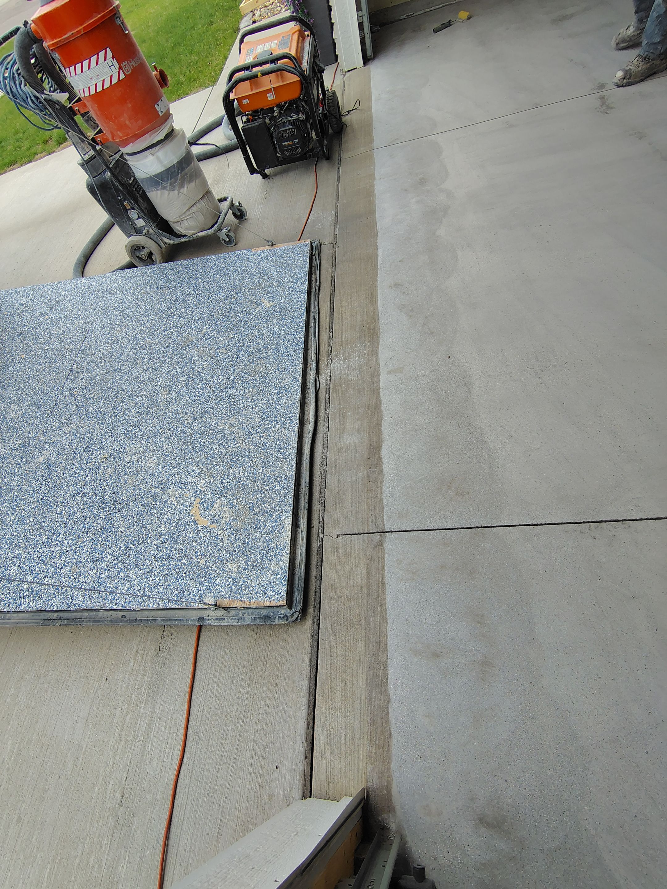 Epoxy Garage Floor Coating with Decorative Flake in Harrisburg by Select Painting, Coatings & Garage Cabinets