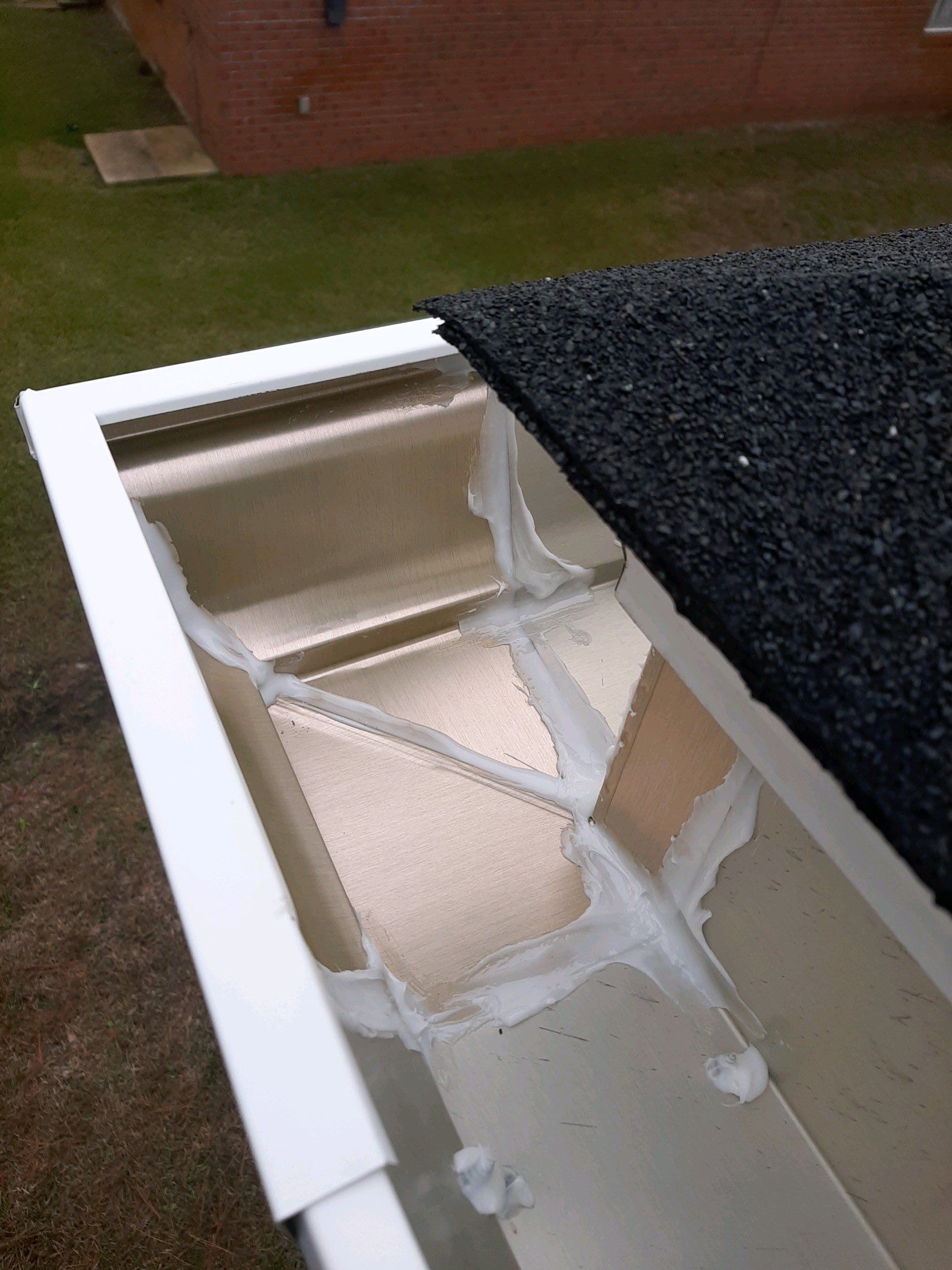 Gutter Installation using White K-Style Seamless Gutters by Gutter Professors