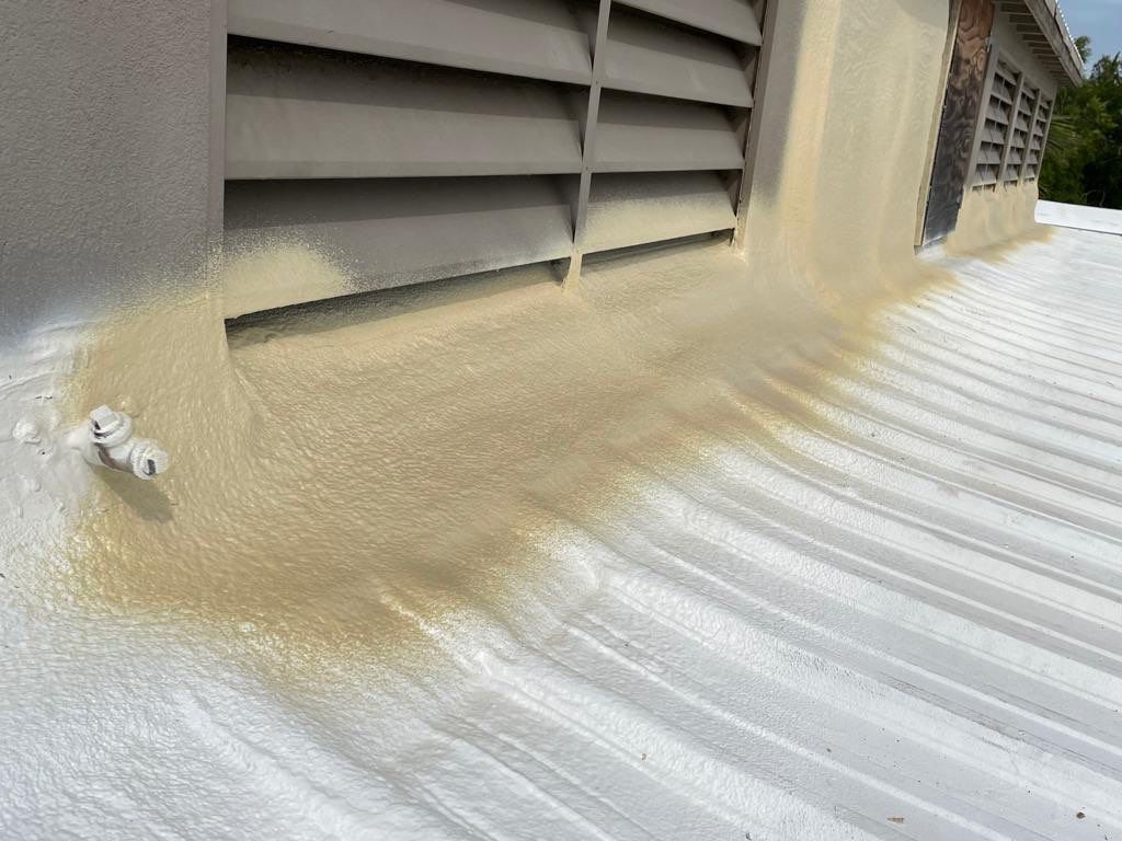 Metal roof restoration on commercial roof using Conklin Benchmark/ PUMA XL acrylic coatings over metal and foam by Straight Edge Roofing Inc