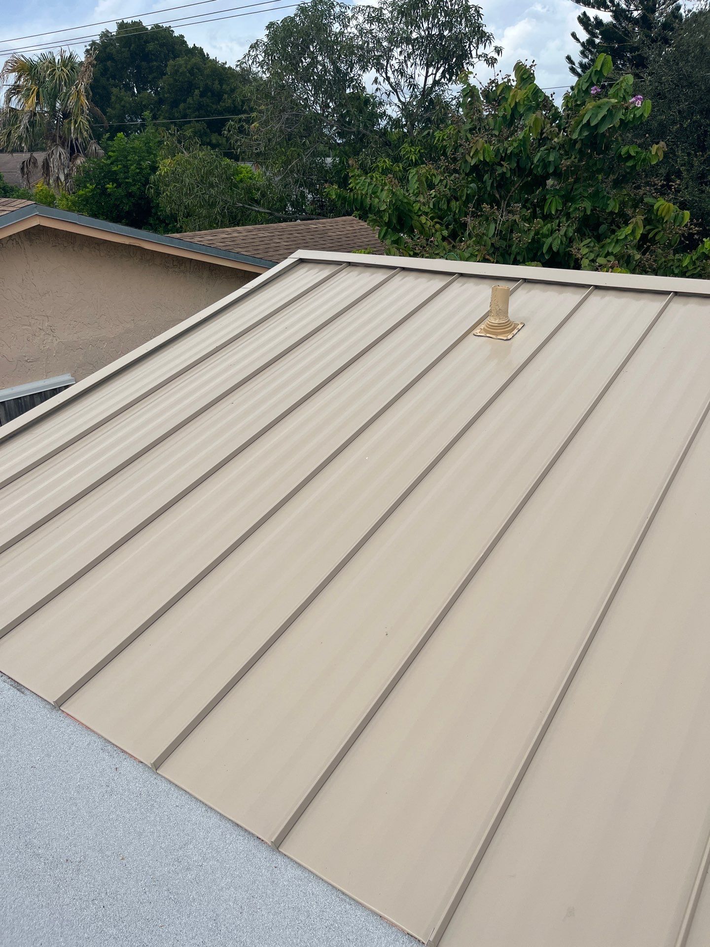 Sandstone Standing Seam by Reimagine Roofing