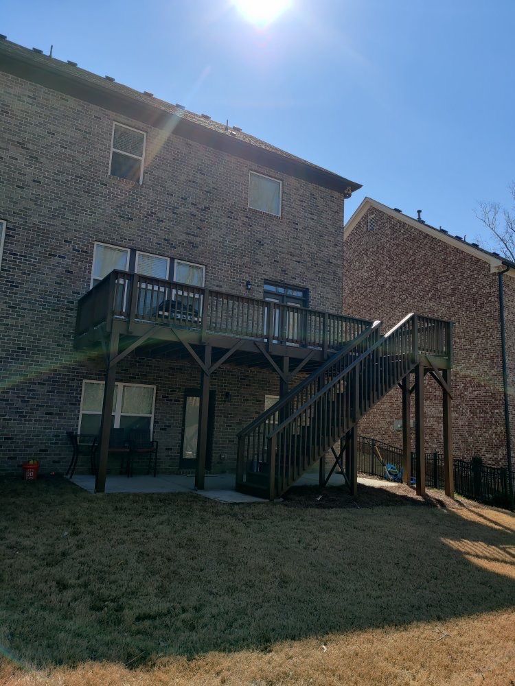 Dark Wood Deck Staining and Refinishing in Suwanee by Swift Home Renovations