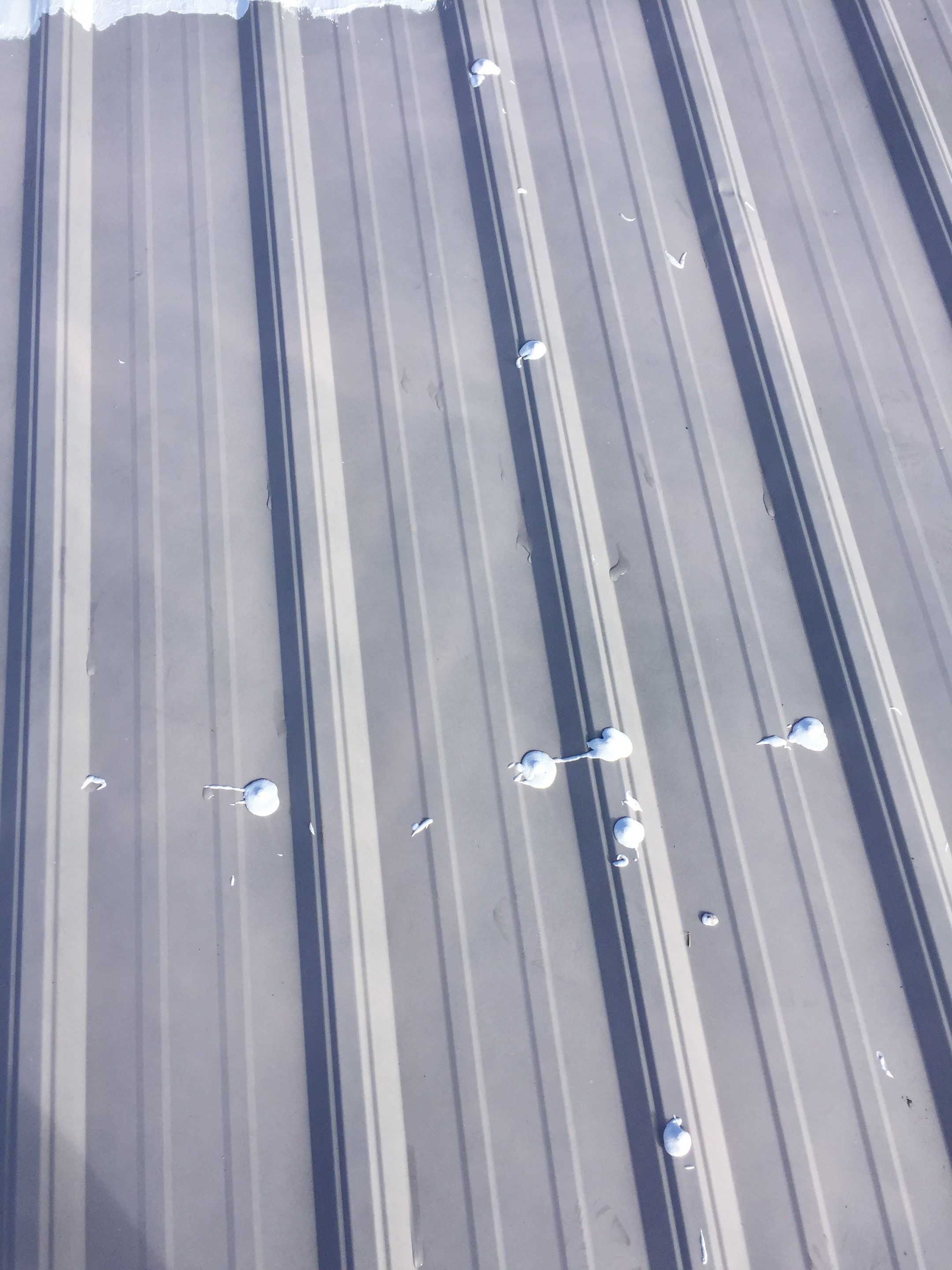 Commercial Roof Coating using Gaco Silicone Roof Coating by Secure Construction Company Inc