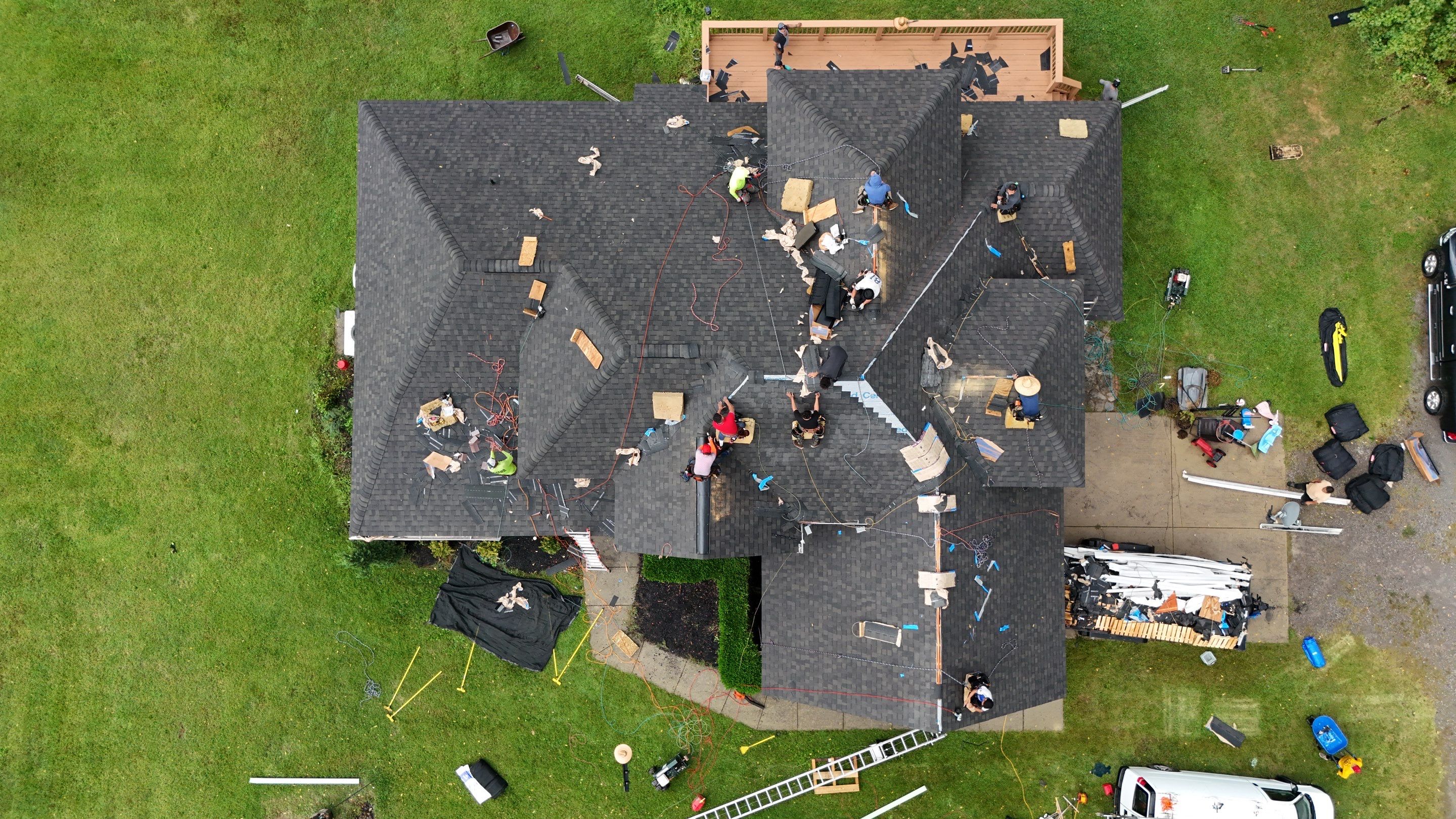 Espresso Re-Roof & Gutters by Royal House LLC