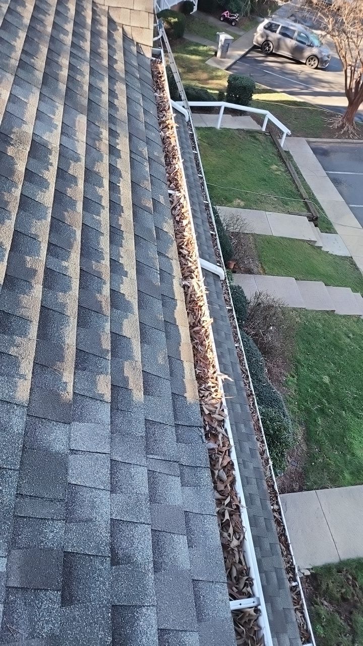 Gutter Cleaning using water by Power Wash Masters LLC