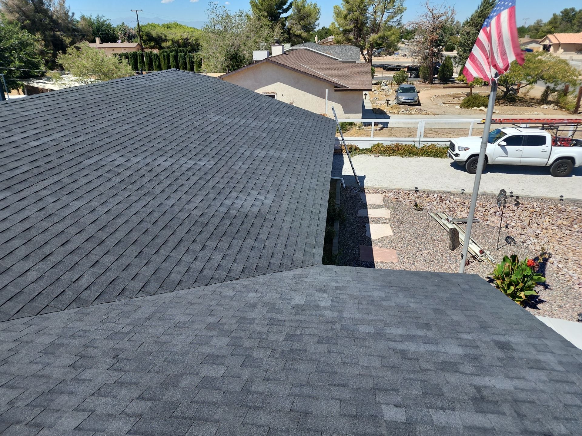 Onyx Black Shingles by Reimagine Roofing
