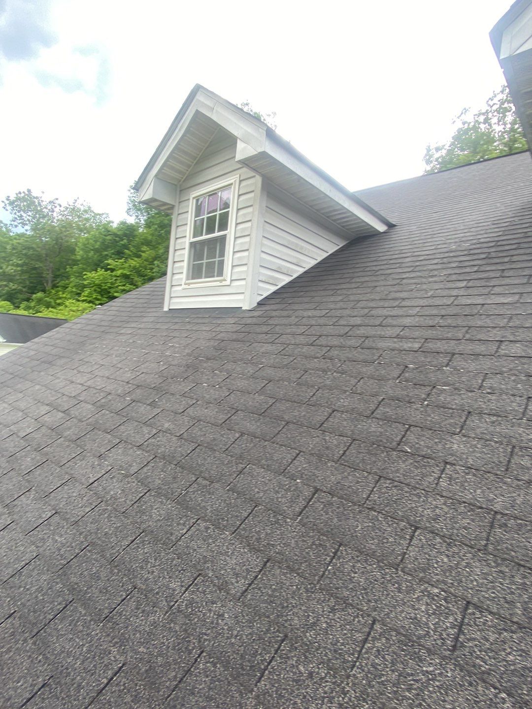 Residential Roofing Installation using Performance Shingles by Mr. Roofer
