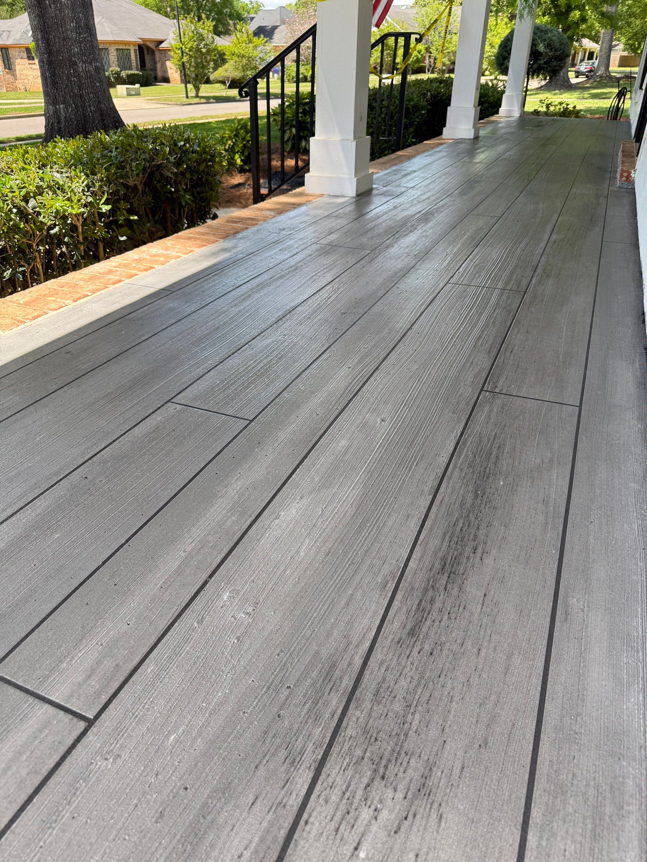 Wood-Grain Stenciled Concrete Porch Resurfacing in Mobile by Cornerstone Hard Surface Restoration 