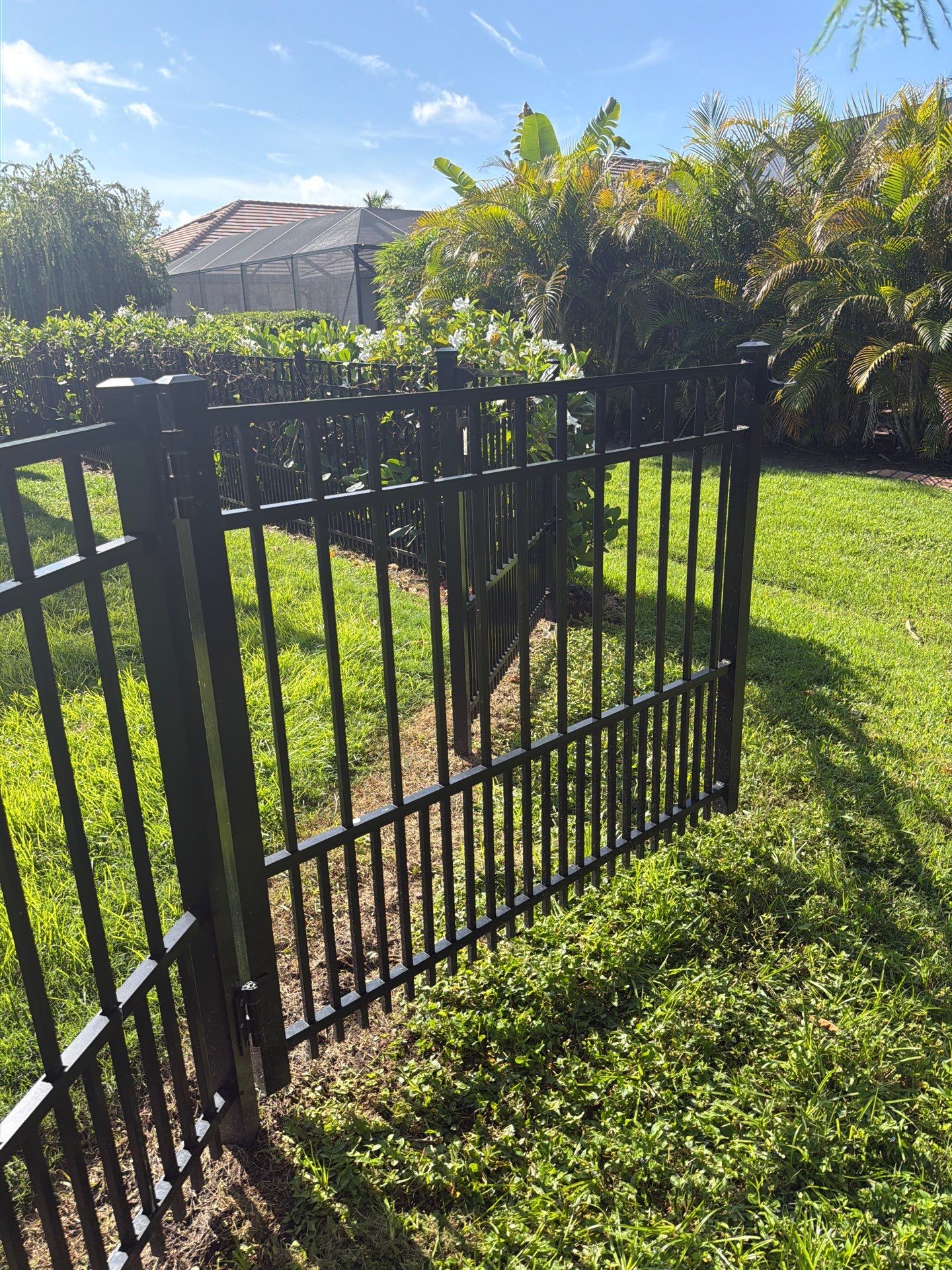 customer with puppy picket aluminum  by H&Y Fence