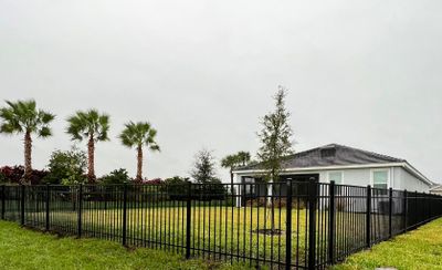 Aluminum Fence Installation using Black 3 Rail Aluminum Fence