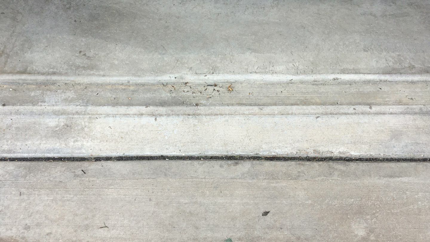 Large Patio + Garage Project in Moon Township by Floors in a Day, Inc