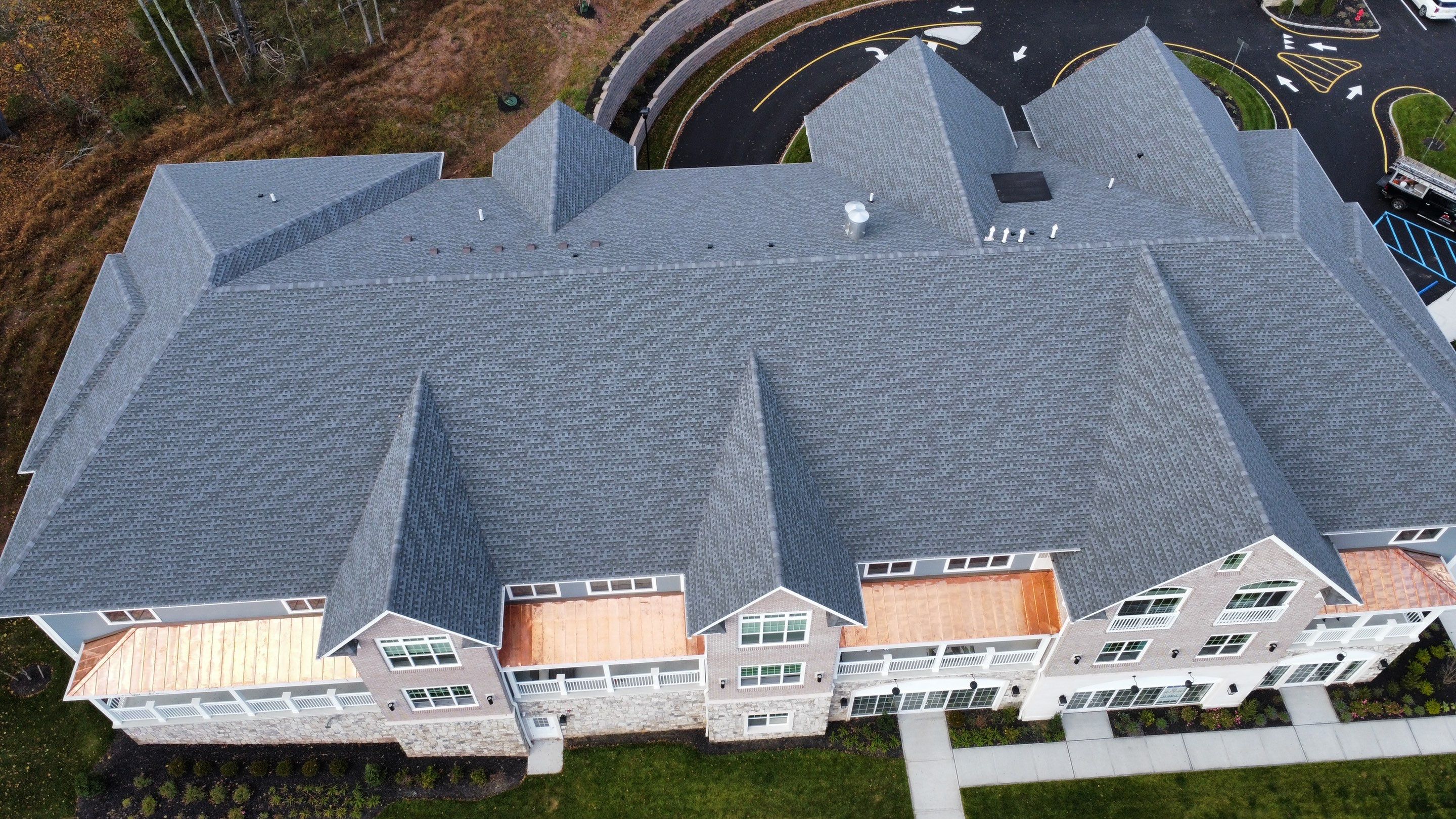 Standing Seam Metal Roof using Copper by CMNG LLC