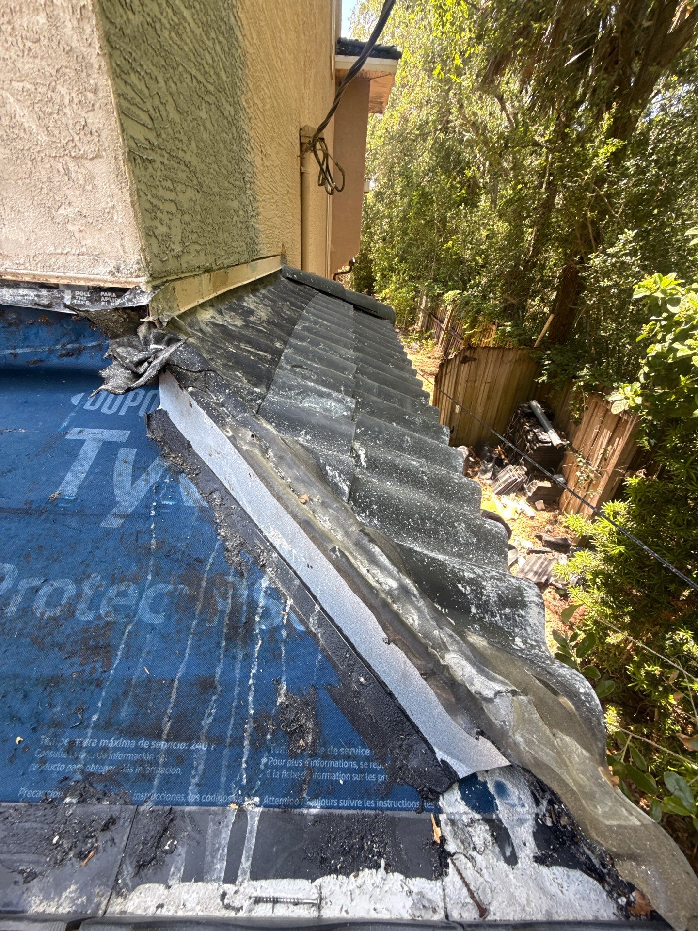Flagler Beach Residential Tile Roof Replacement with Dark Barrel Tiles by Fortified Roofing Solutions Corp.