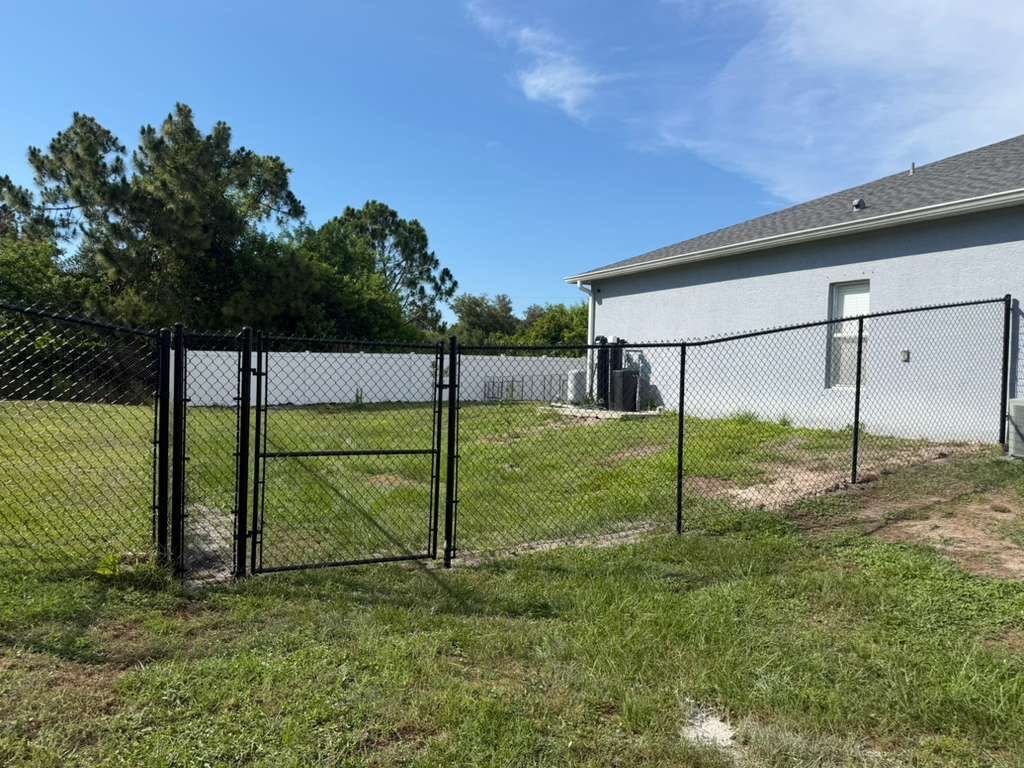 Black Chain Link and Vinyl Privacy Fence Installation in North Port by True Fence LLC