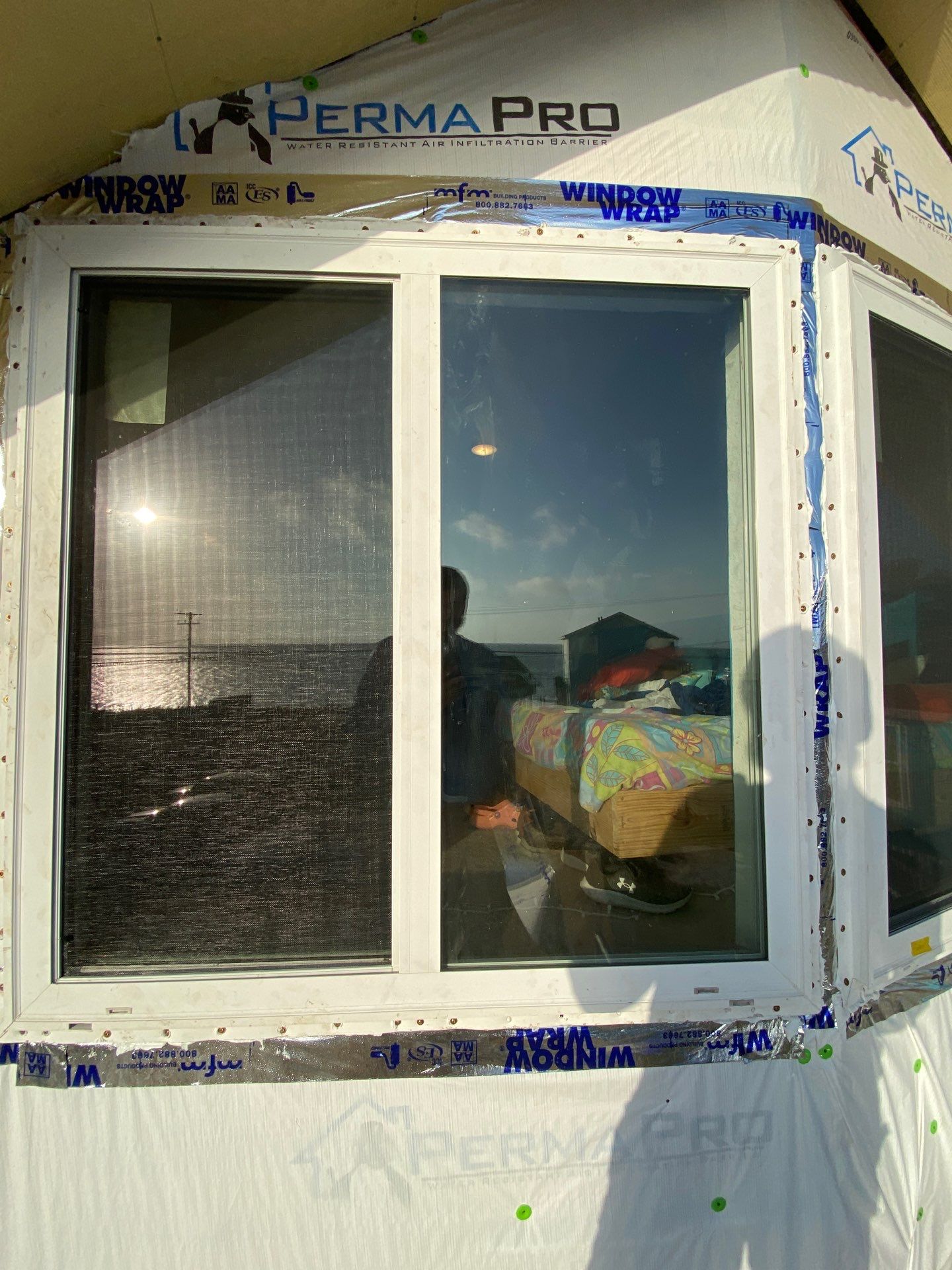 Installing Windows on a Submarine  by Bayfront Roofing and Construction