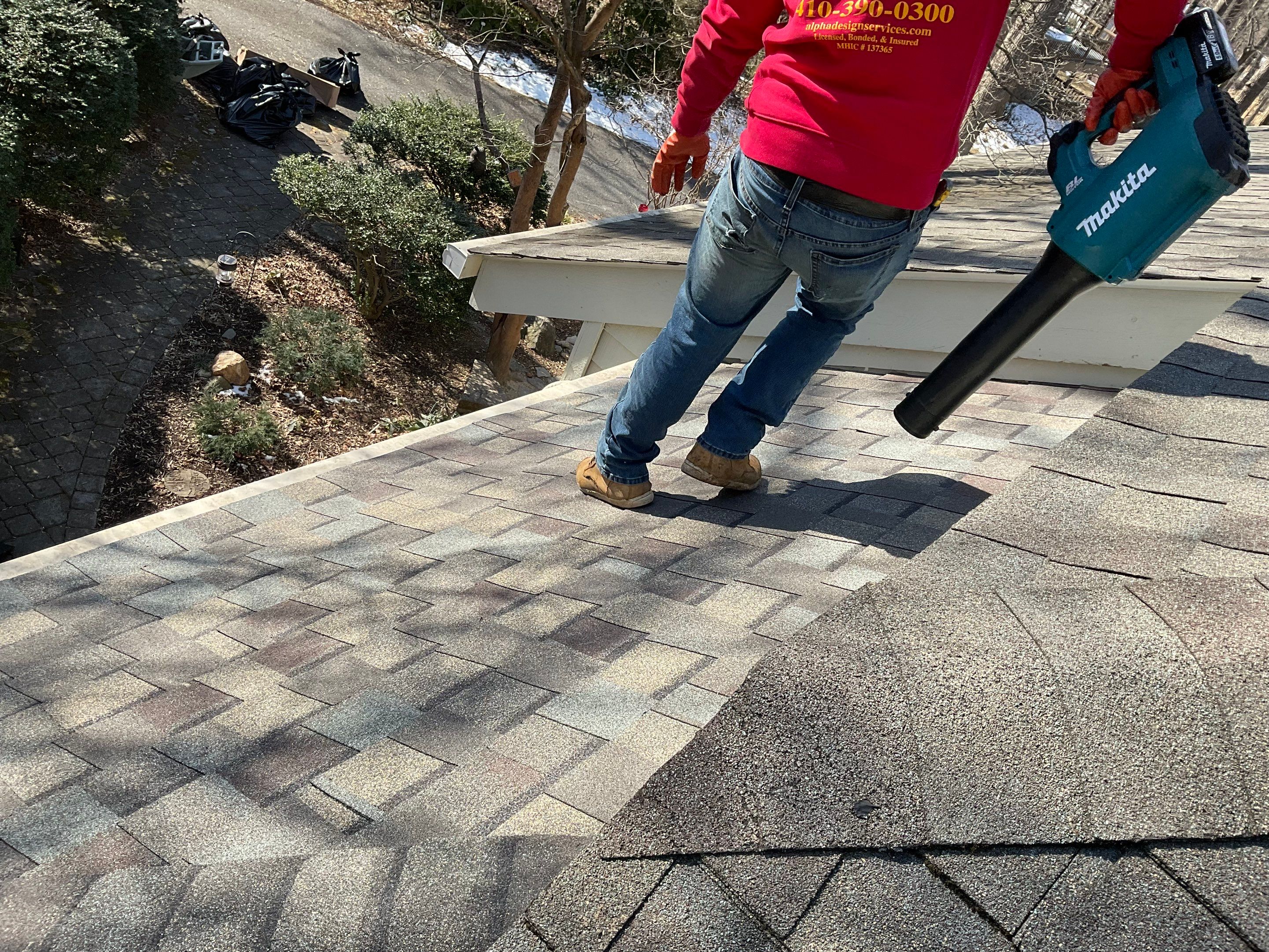 Install new shingles and new skylights  by Alpha Design Services