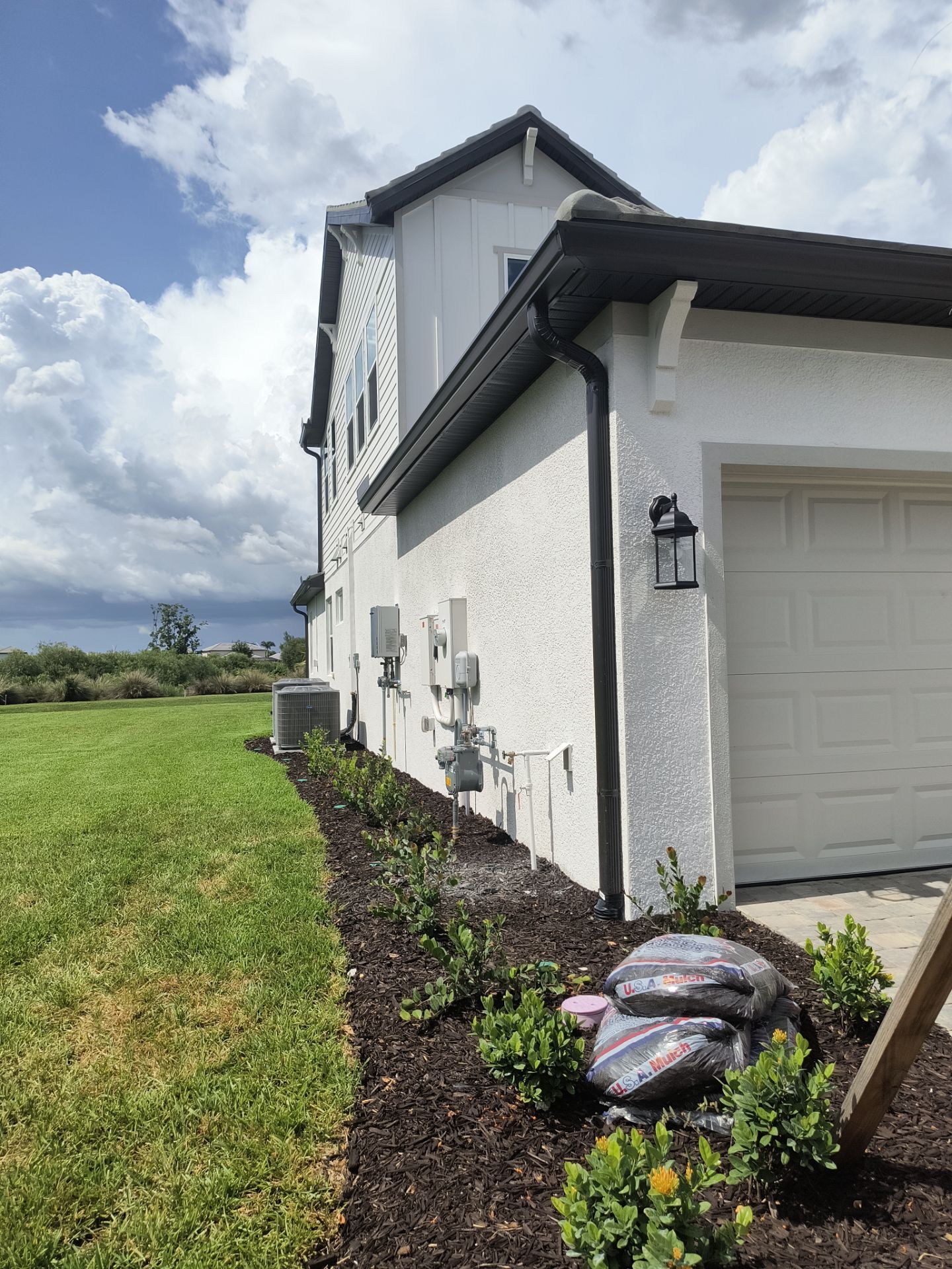 Dark Bronze Gutter Installation in Bradenton FL by Gutter Professors