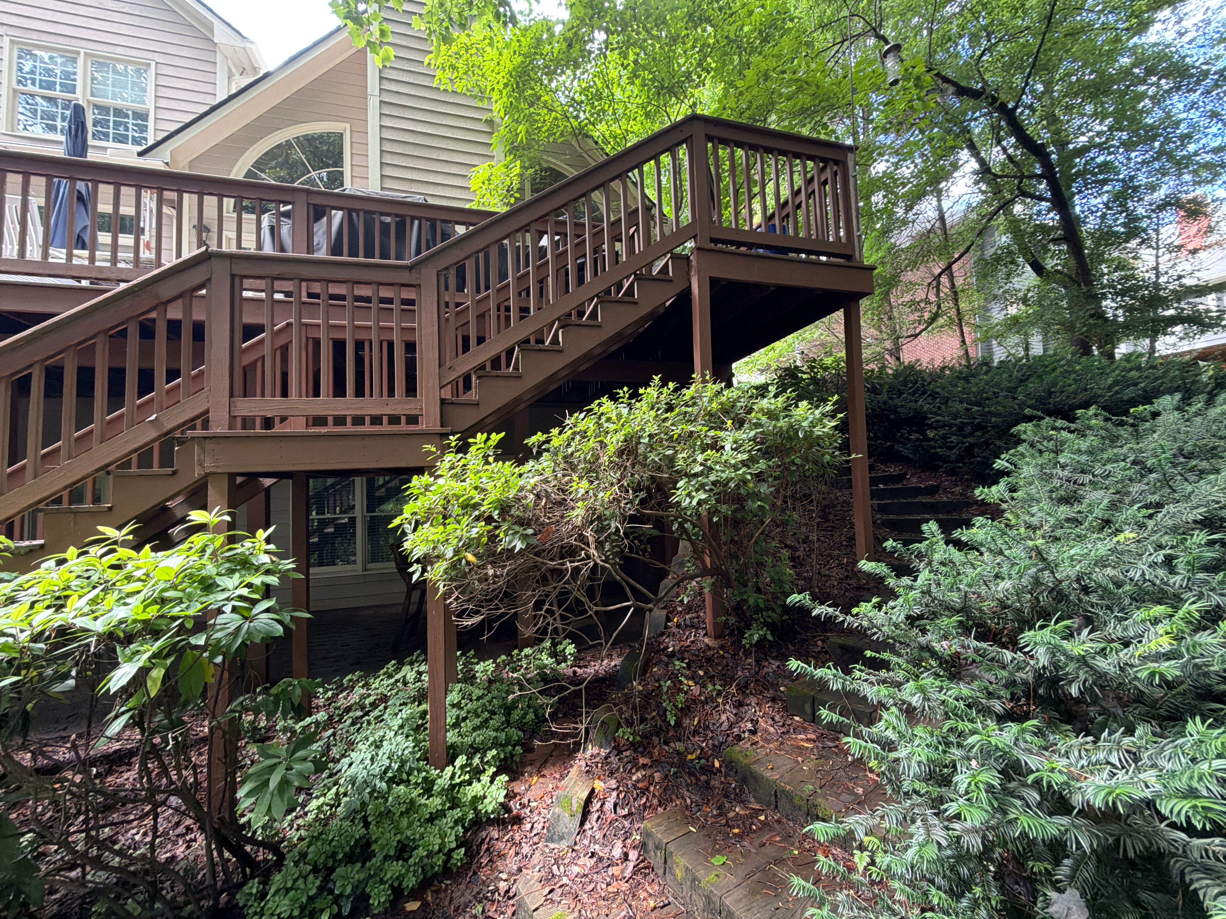 Full James Hardie Siding Replacement and Trex Deck Resurface in the Saddle Color by Nelson Exteriors 