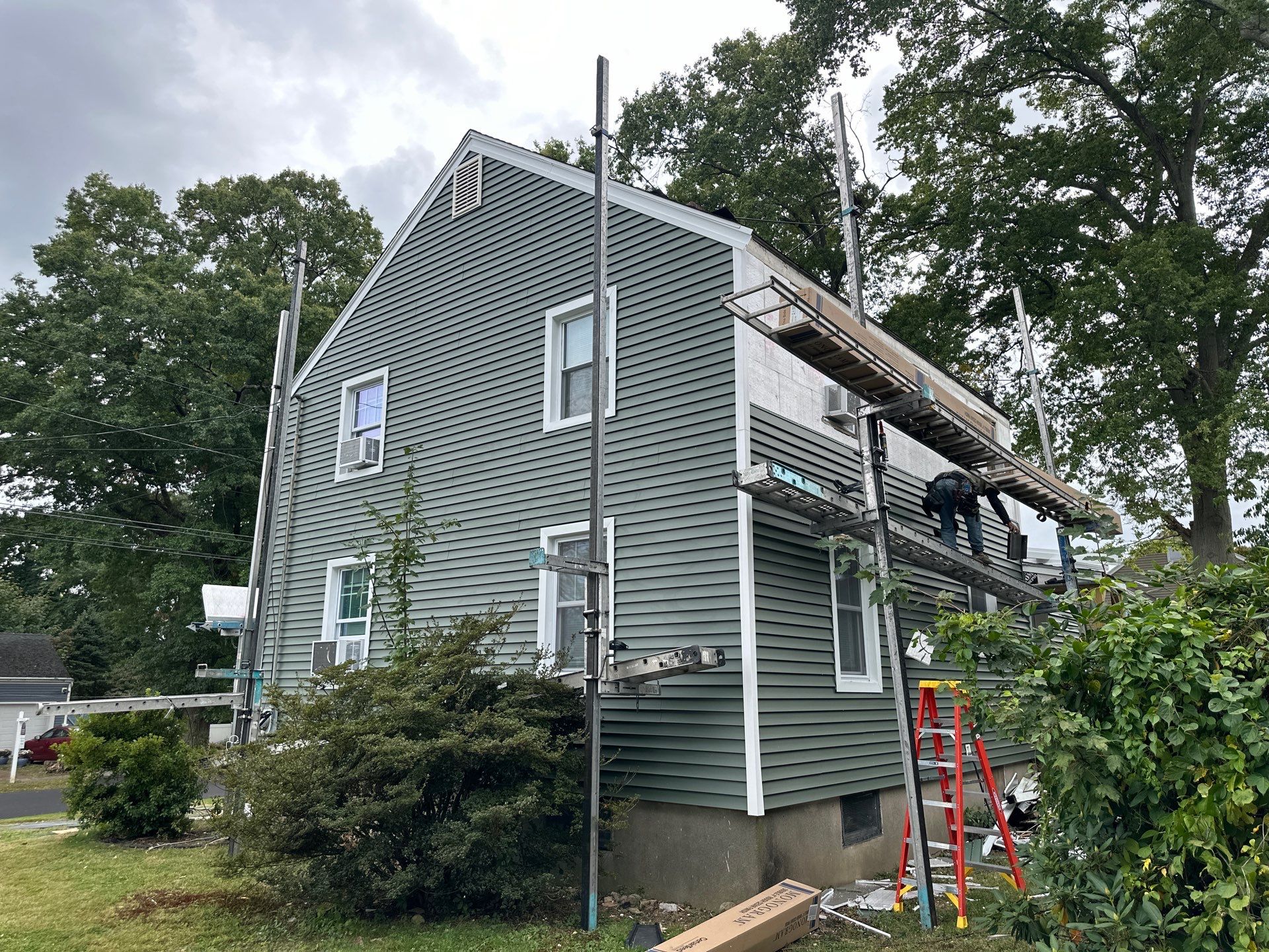 Siding Installation using CertainTeed Monogram Vinyl Siding - D4 - Forest by A Plus Exterior