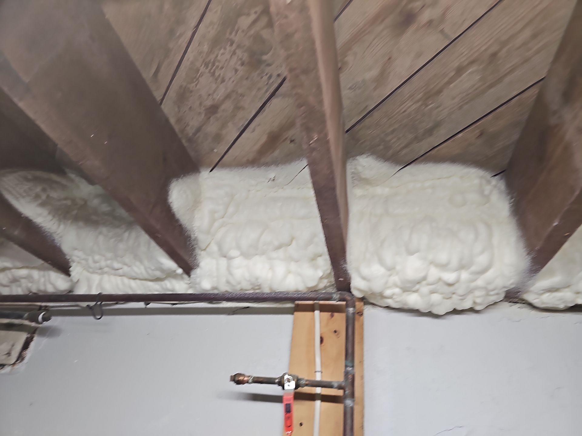 Attic Insulation using open cell spray foam by NYS Foam & Energy