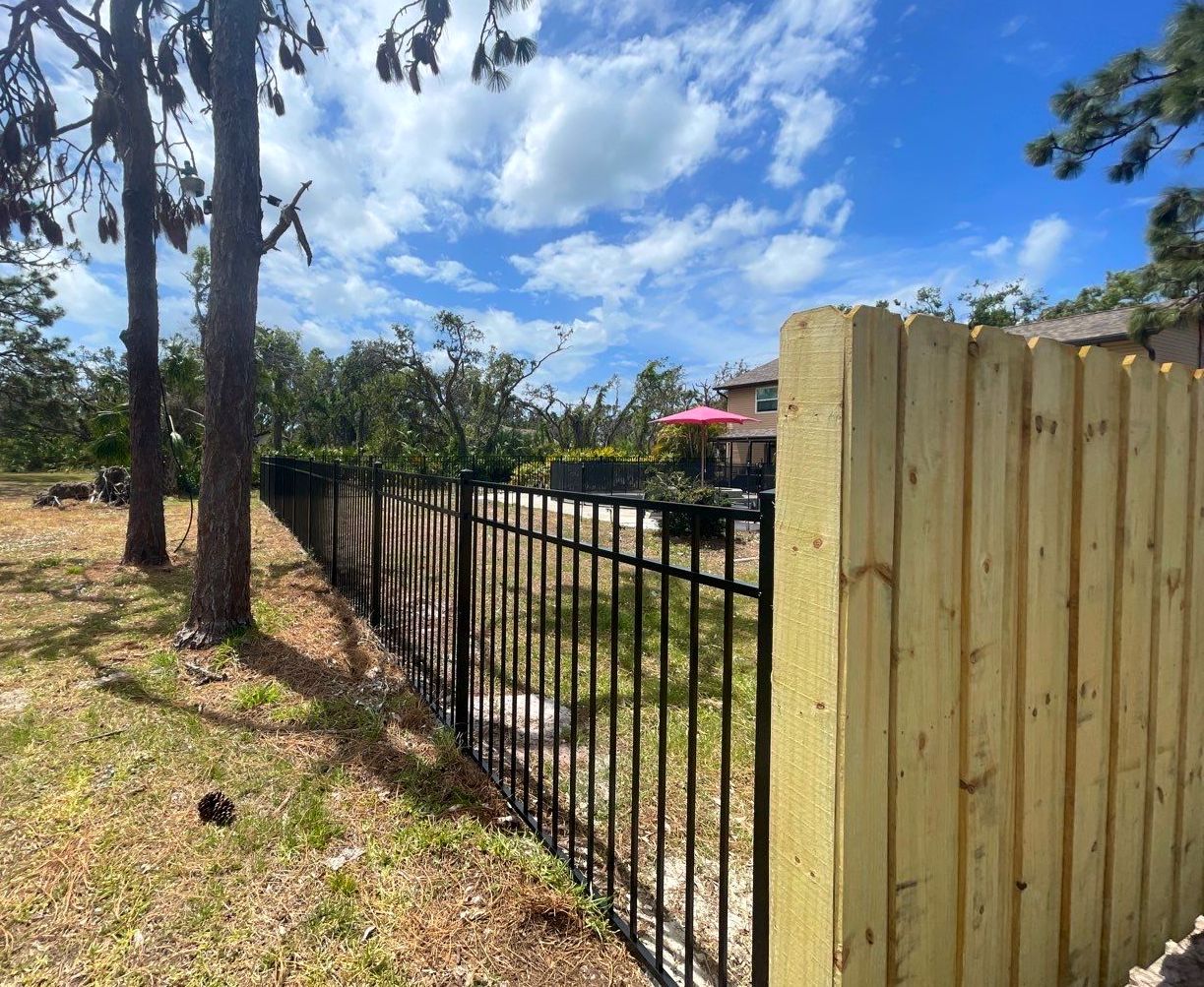 Black Aluminum 3 Rail Fence and Treated Wood Board on Board Privacy Fence  by Asap fence and gates, LLC