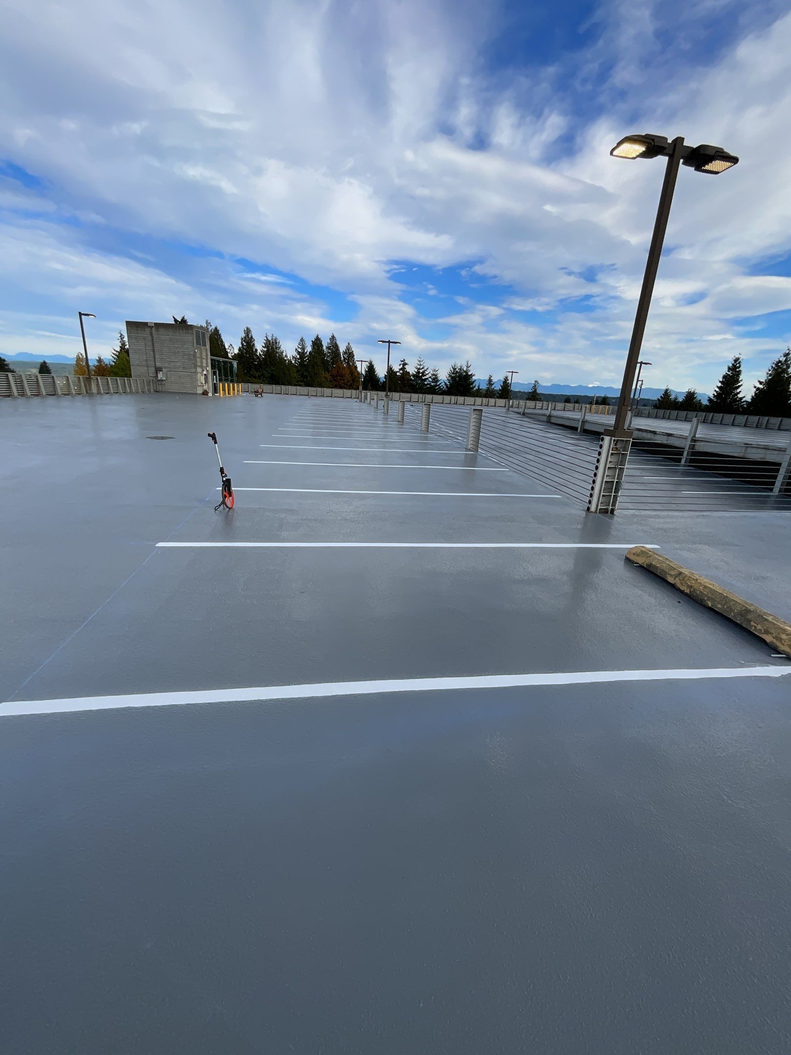 Corti Construction | Striping for Concrete Parking Lot by Jireh Asphalt & Concrete Inc 
