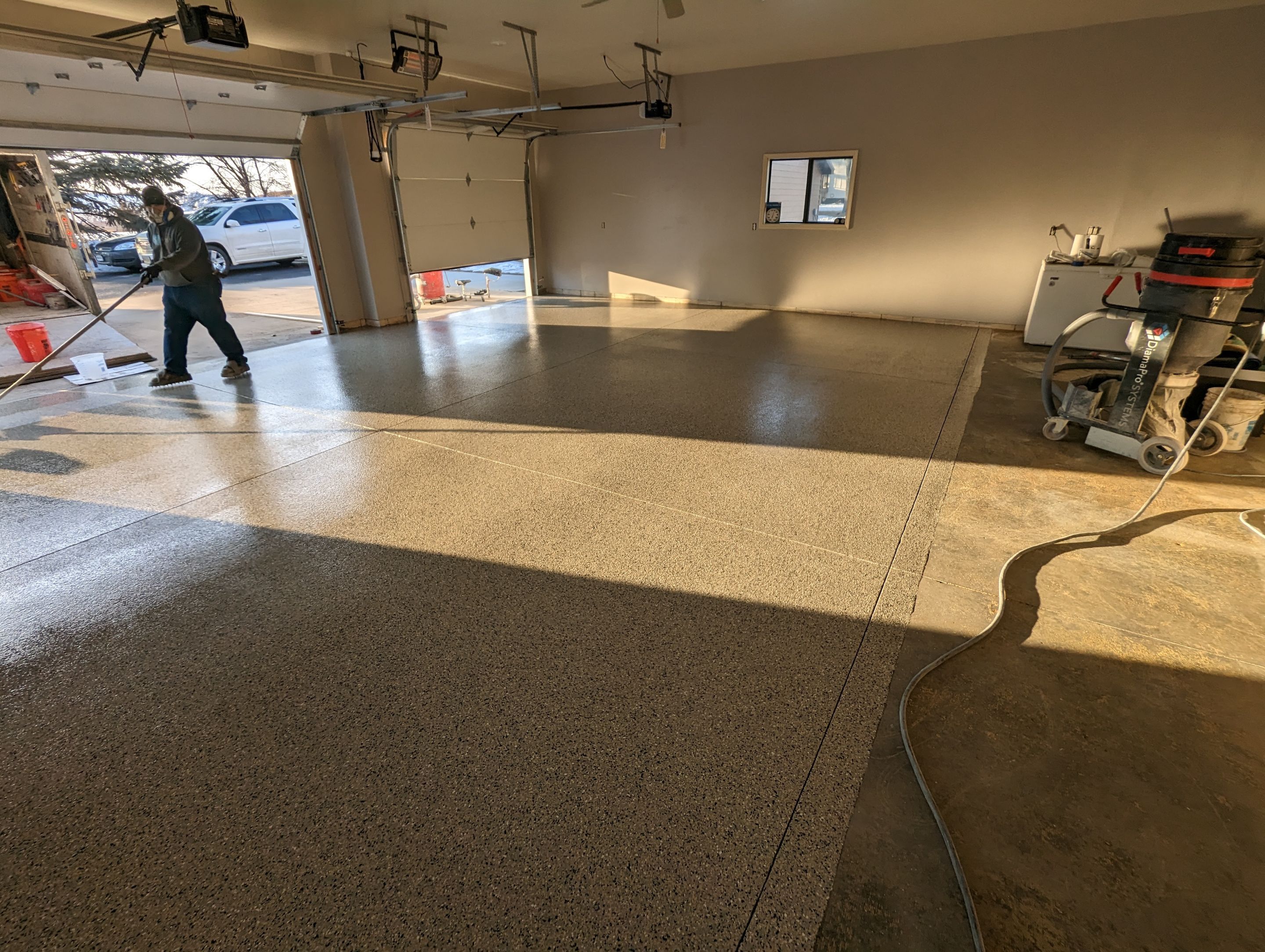 Garage using Mediterranean by Select Painting, Coatings & Garage Cabinets