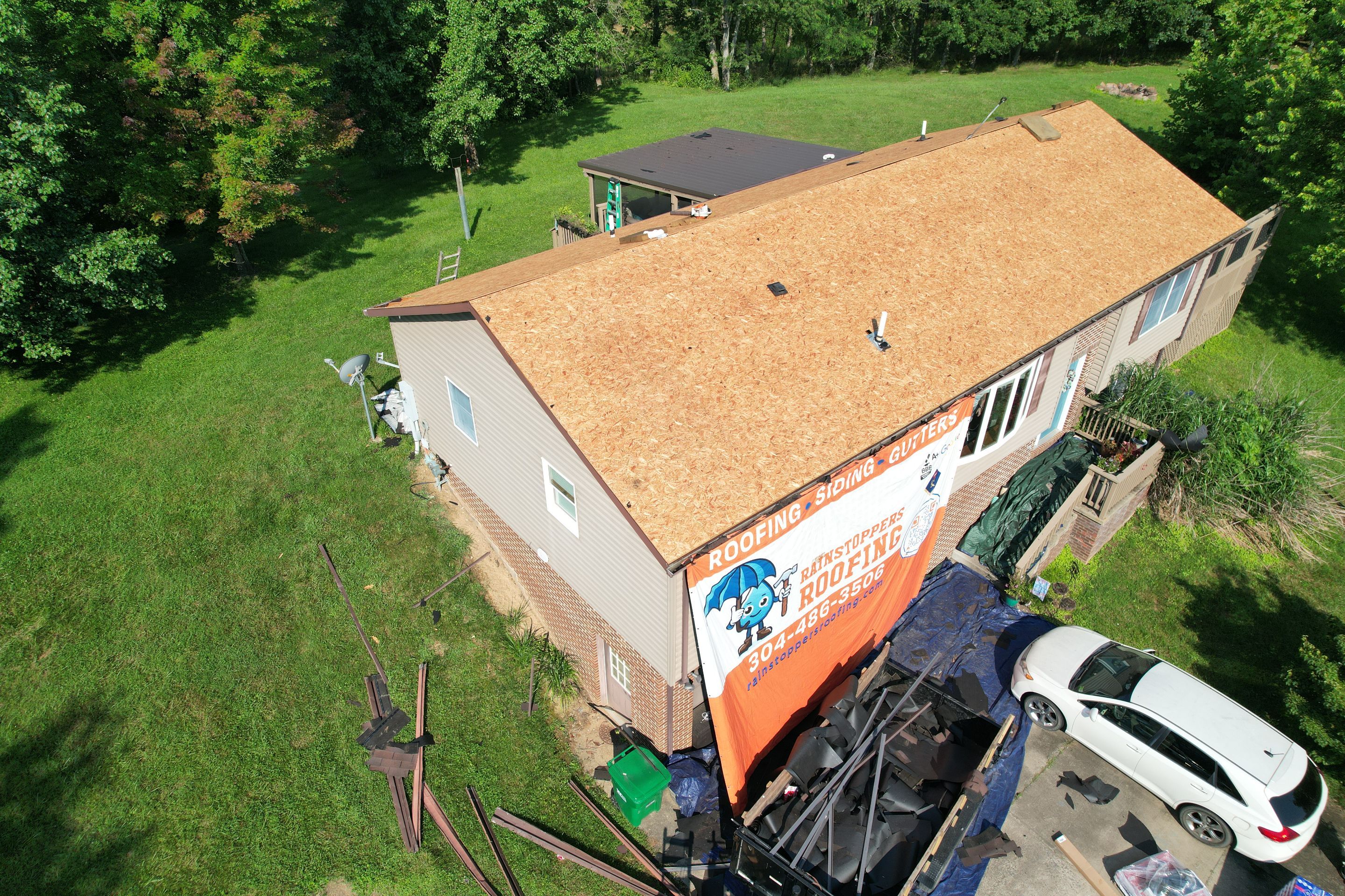 Residential Roofing Installation using GAF Timberline HDZ Charcoal by Rainstoppers Roofing