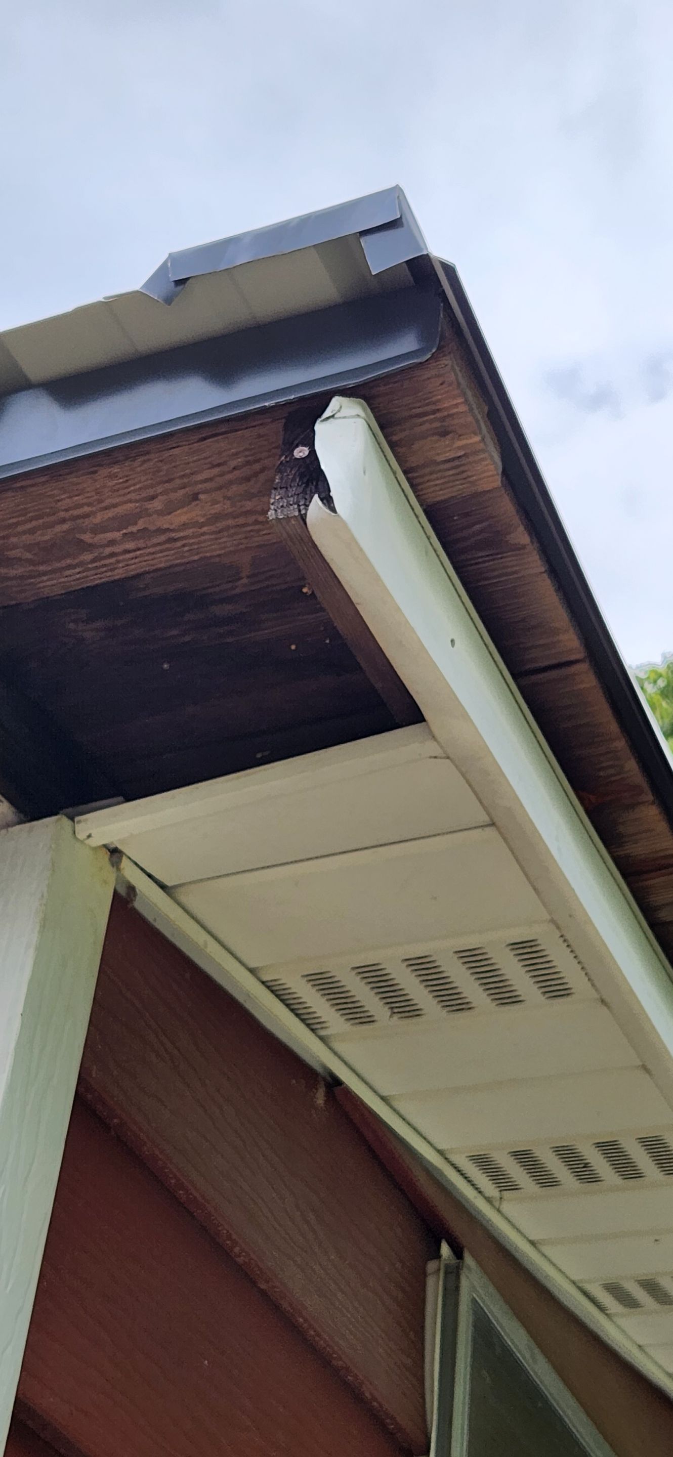 Residential Roofing Installation using 26 Gauge Colored Panels by Hostetler Roofing