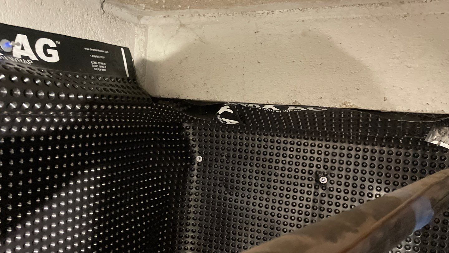Interior Drain Tile & Sump Pump System in West Minneapolis by Waterproofing Northeast