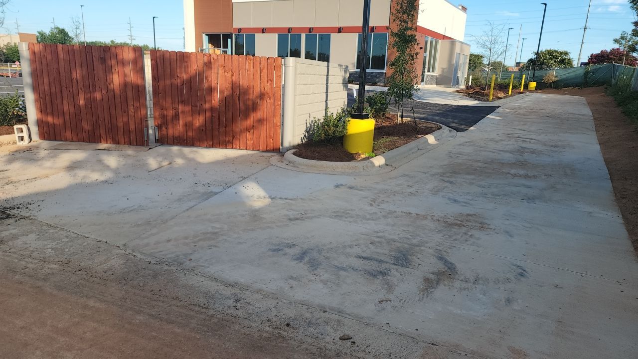 Driveway Clean using cleaner by Power Wash Masters LLC