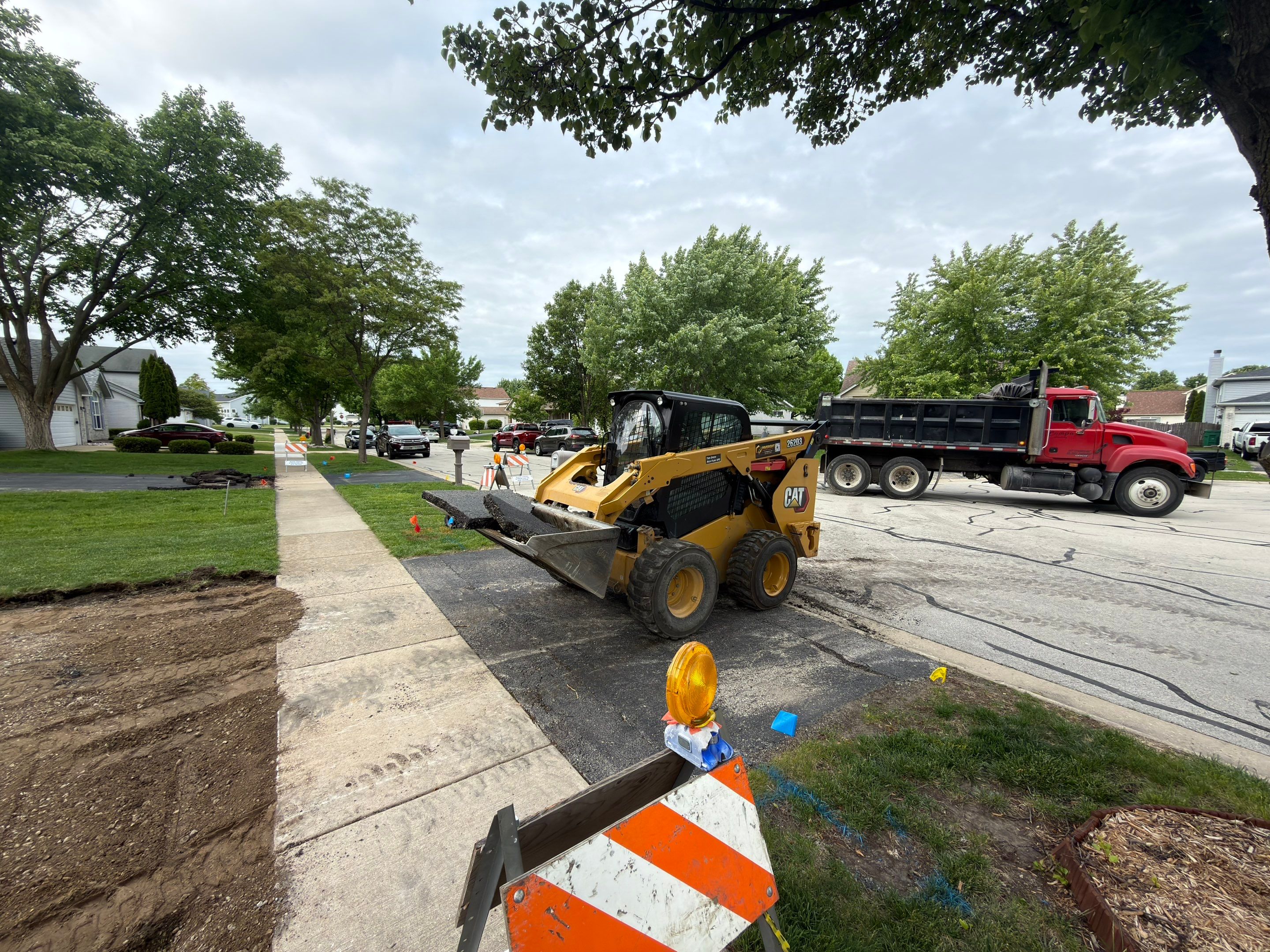 Asphalt Driveway Installation & Curb Appeal Upgrade by PaveRight Concrete&Asphalt LLC