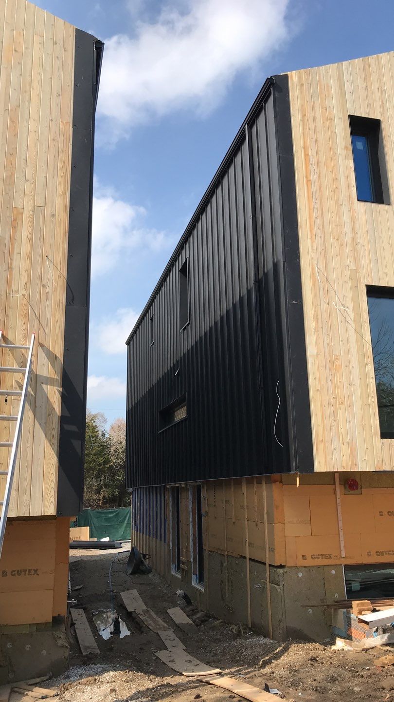 New Home Construction using 16" Standing Seam Panels by Jay Carter Roofing & Sheet Metal