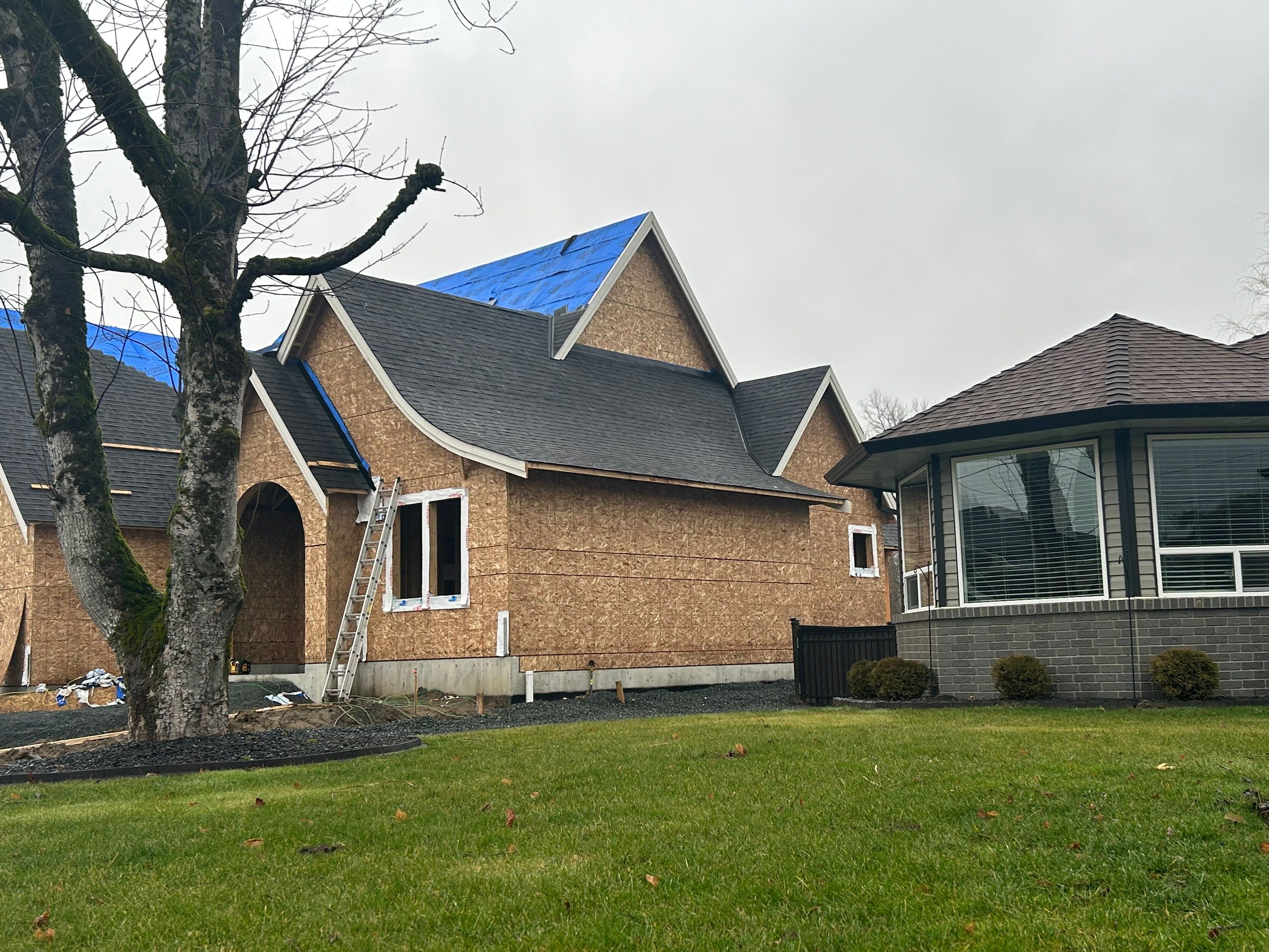 Residential Roofing Installation using Malarky Vista Shingles and Prolok Metal  by Top Notch Roofing Inc