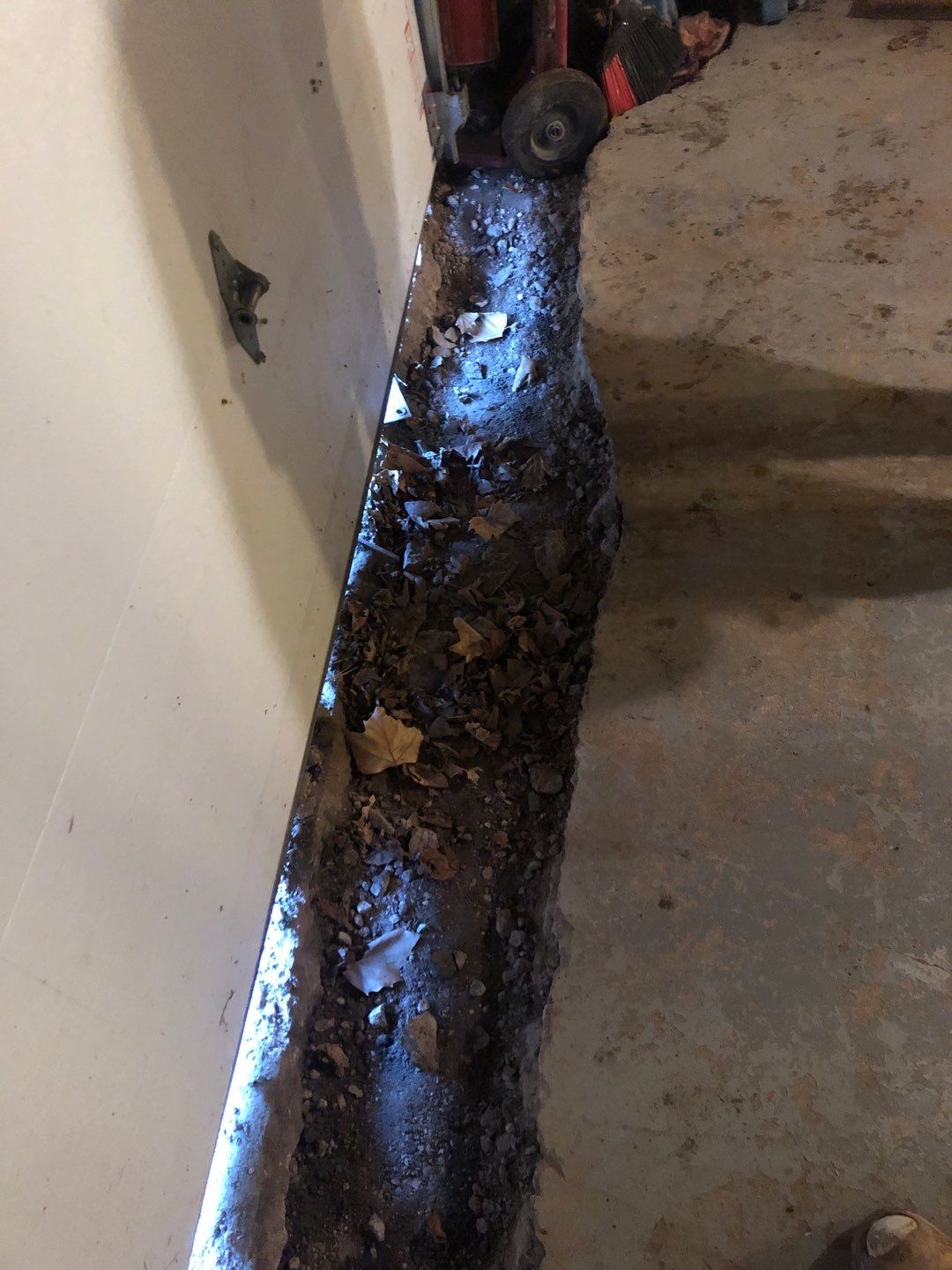 Basement Waterproofing using Drain tile system and a foundation wrap by ACE Waterproofing & Basement Solutions